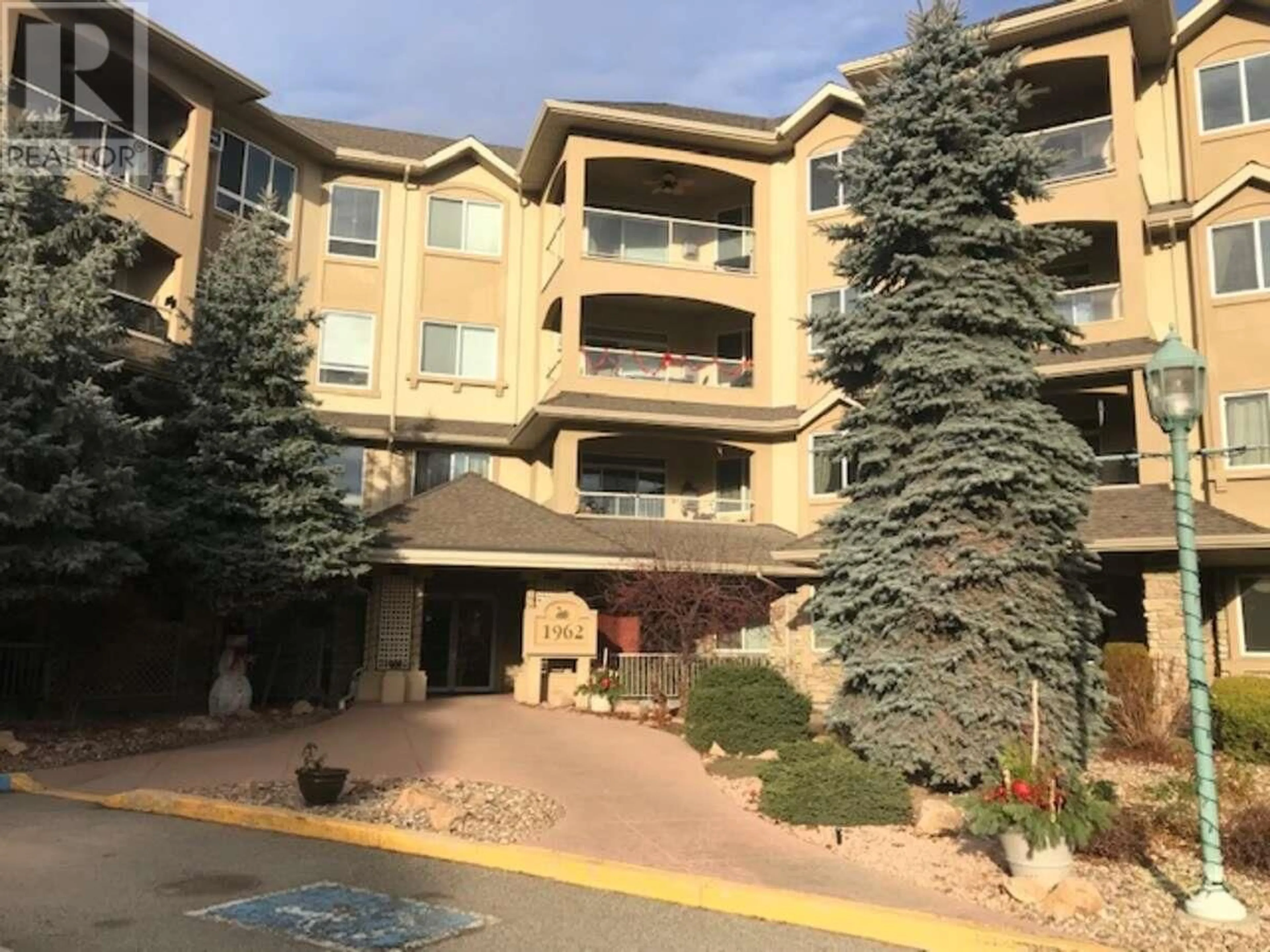 A pic from exterior of the house or condo for 1962 Enterprise Way Unit# 113, Kelowna British Columbia V1Y9S6