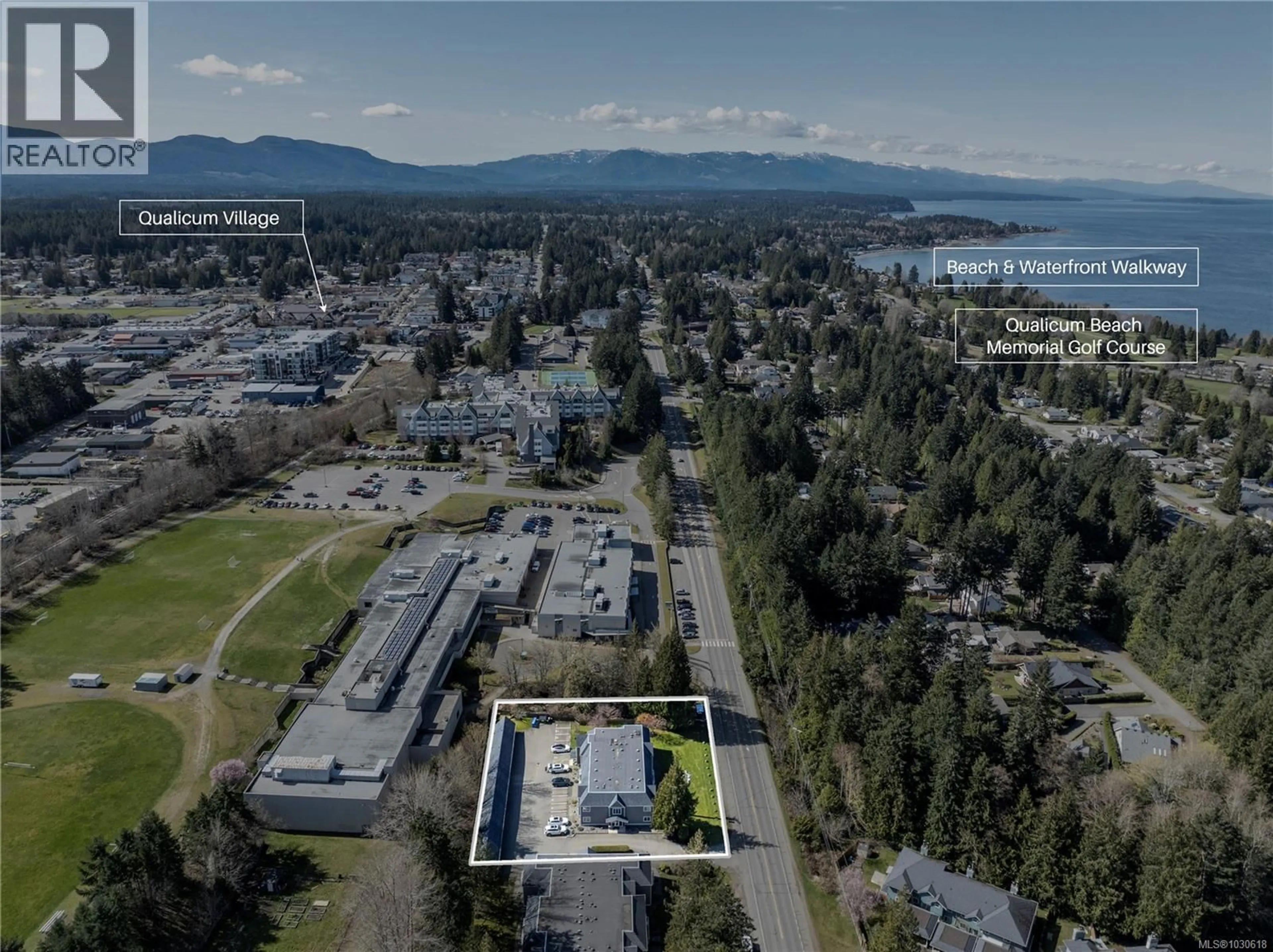 A pic from outside/outdoor area/front of a property/back of a property/a pic from drone, mountain view for 101 - 302 VILLAGE WAY, Qualicum Beach British Columbia V9K2H8