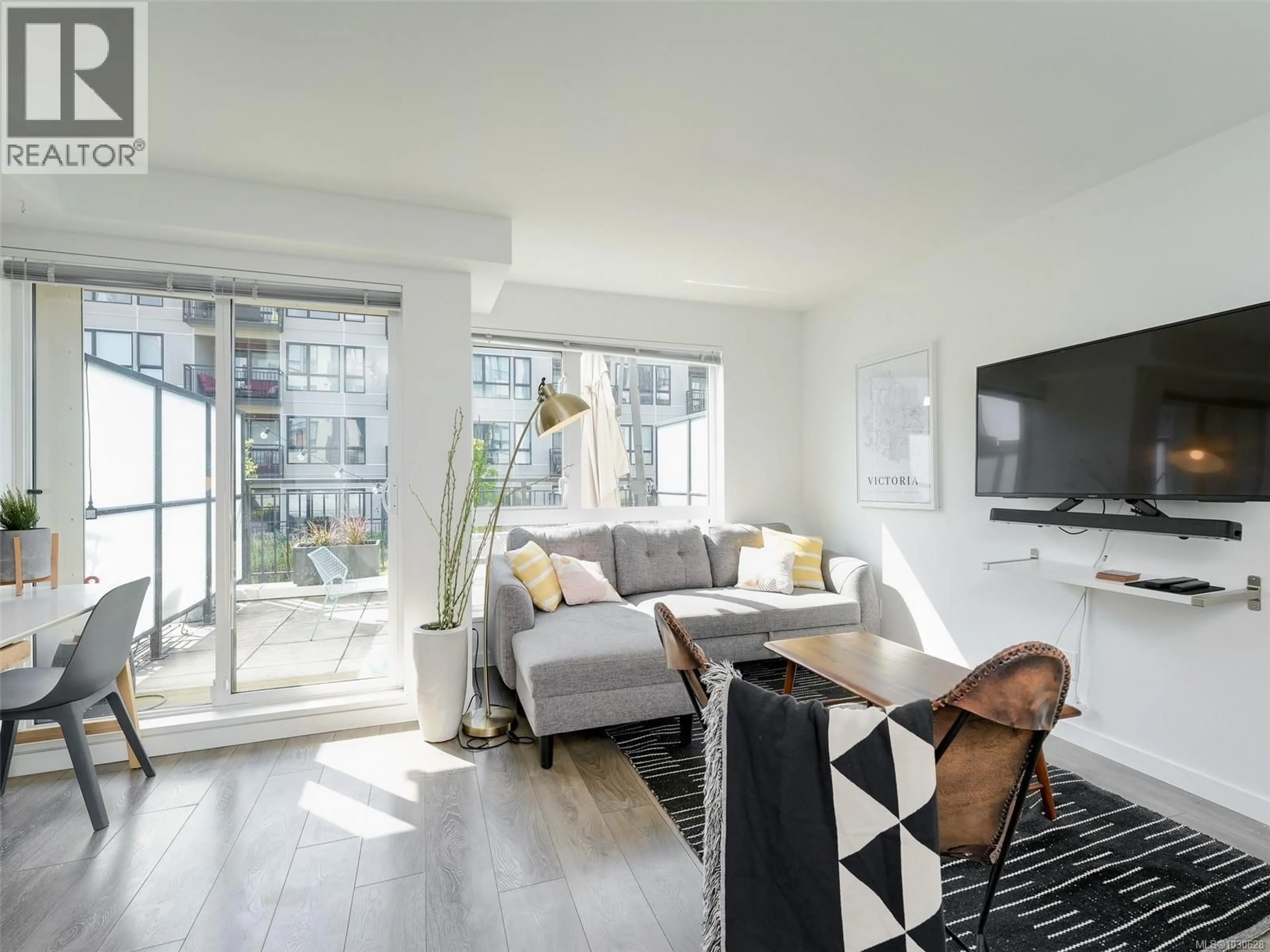 Living room with furniture, unknown for 215 - 517 FISGARD STREET, Victoria British Columbia V8W0C5