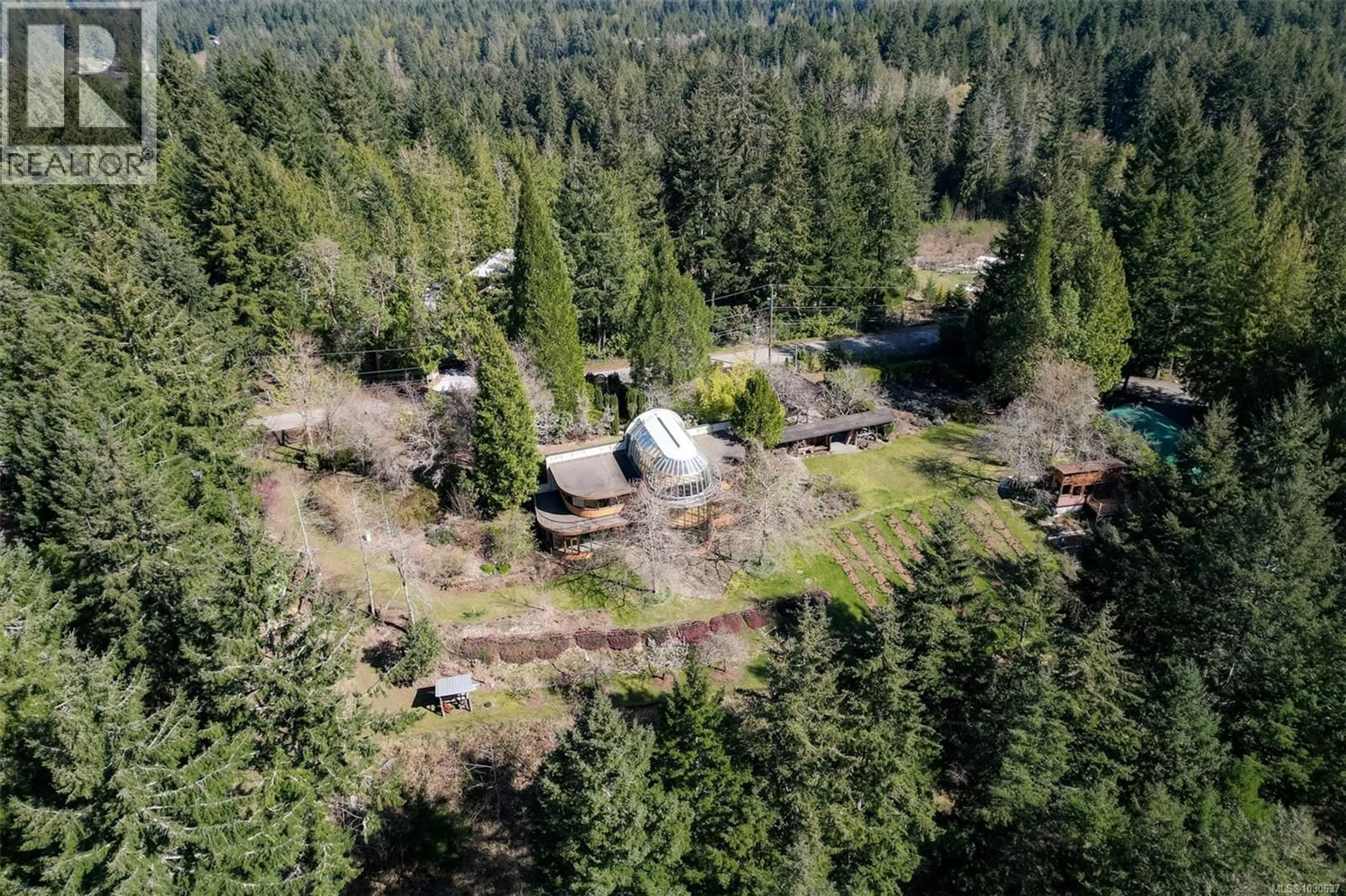 A pic from outside/outdoor area/front of a property/back of a property/a pic from drone, forest/trees view for 1762 WOODEN ROAD, Shawnigan Lake British Columbia V8H2H4