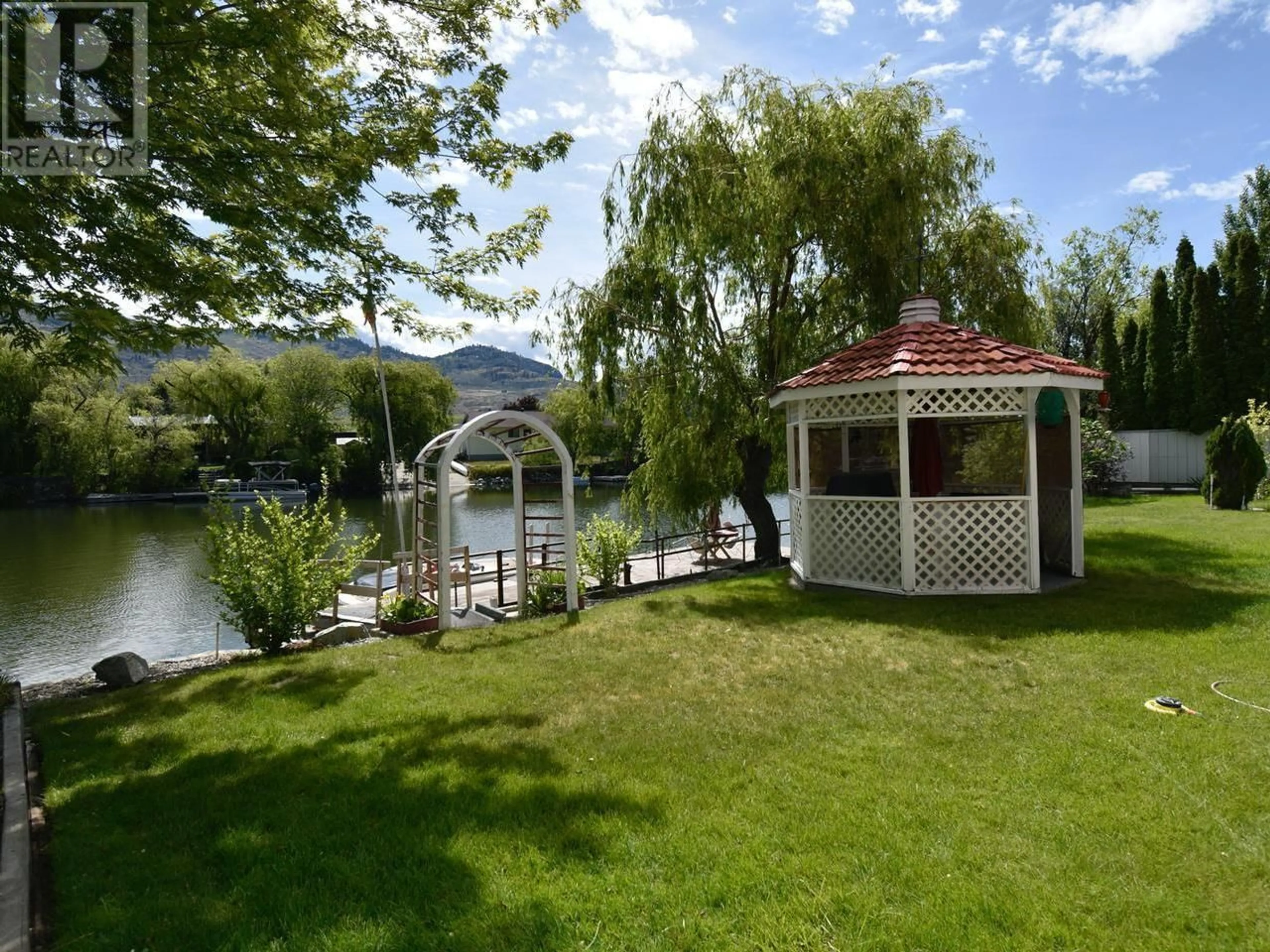 Frontside or backside of a home for 38 HARBOUR KEY Drive, Osoyoos British Columbia V0H1V6