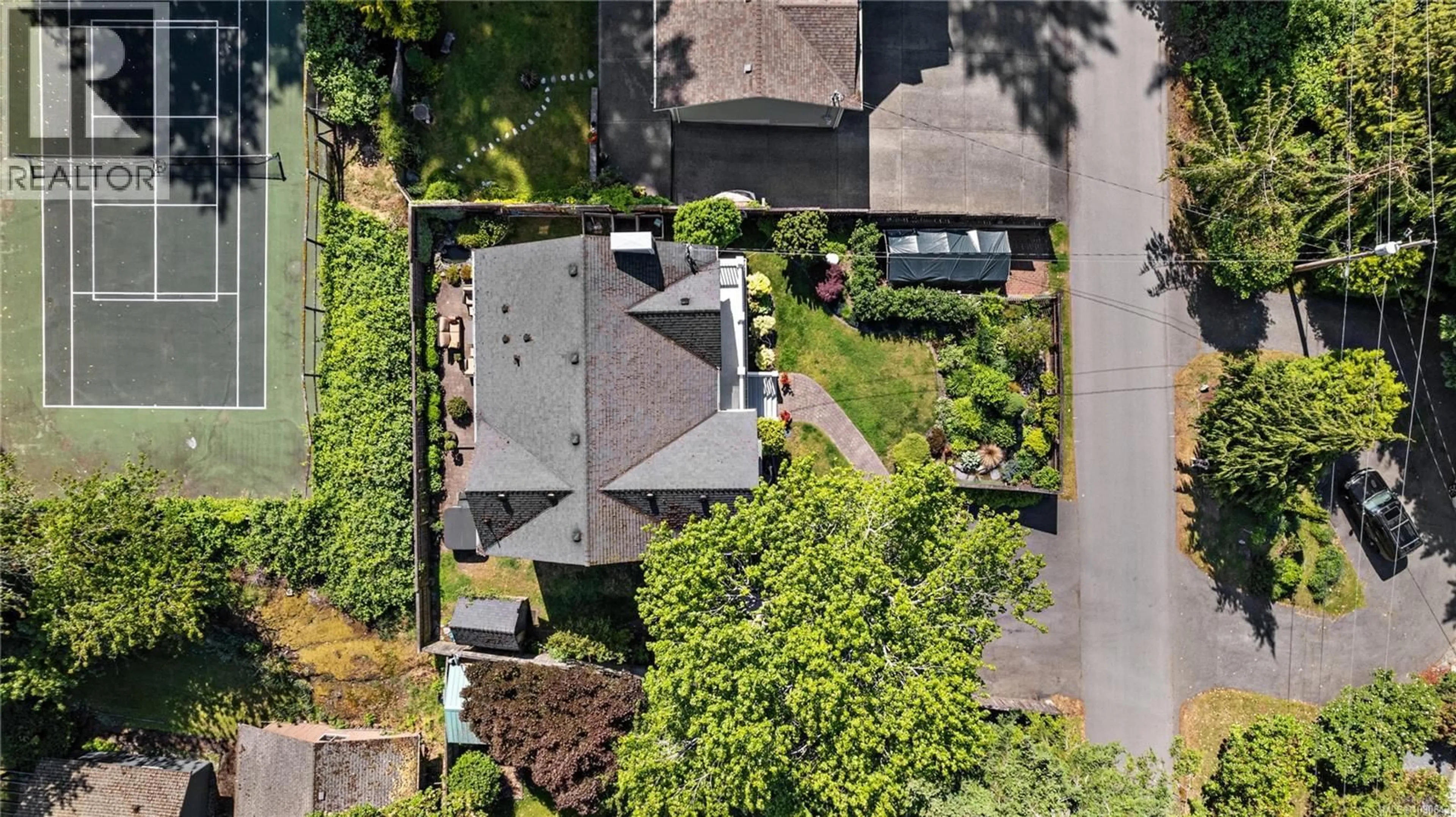 A pic from outside/outdoor area/front of a property/back of a property/a pic from drone, street for 5026 GENOA BAY ROAD, Duncan British Columbia V9L5Y6