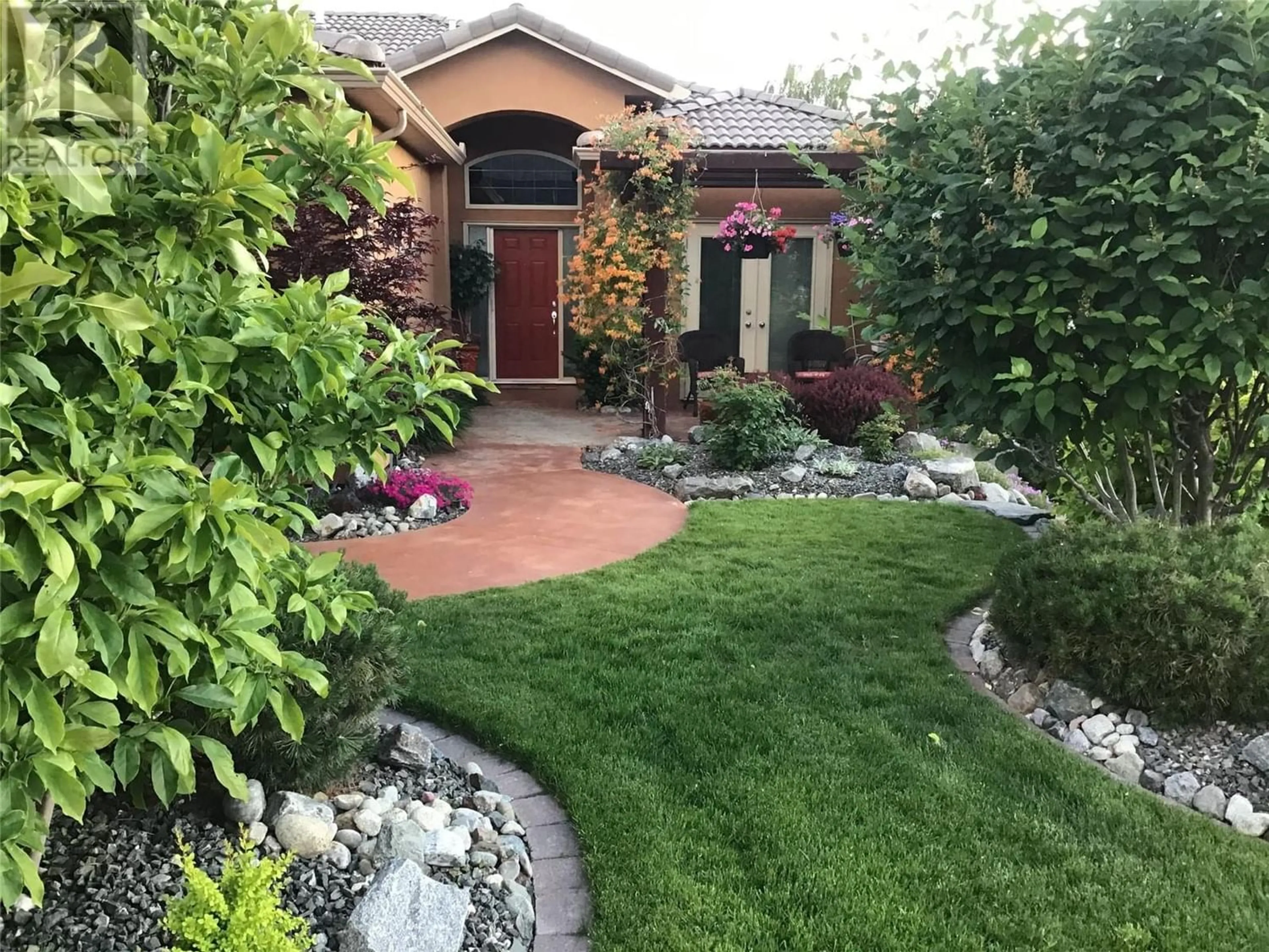 Frontside or backside of a home for 3410 LOBELIA Drive, Osoyoos British Columbia V0H1V4