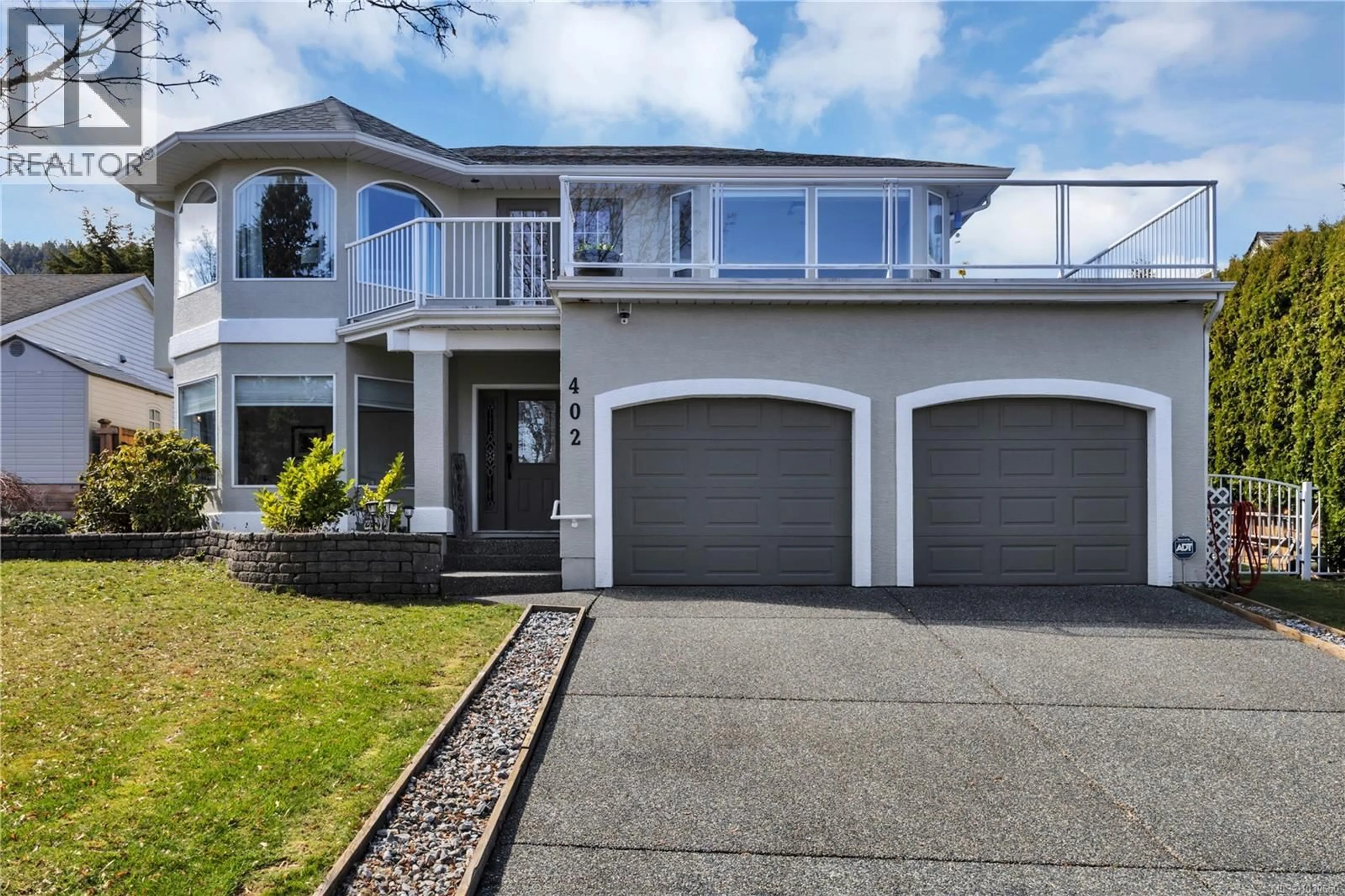 Home with vinyl exterior material, street for 402 TASSIN PLACE, Ladysmith British Columbia V9G1W8