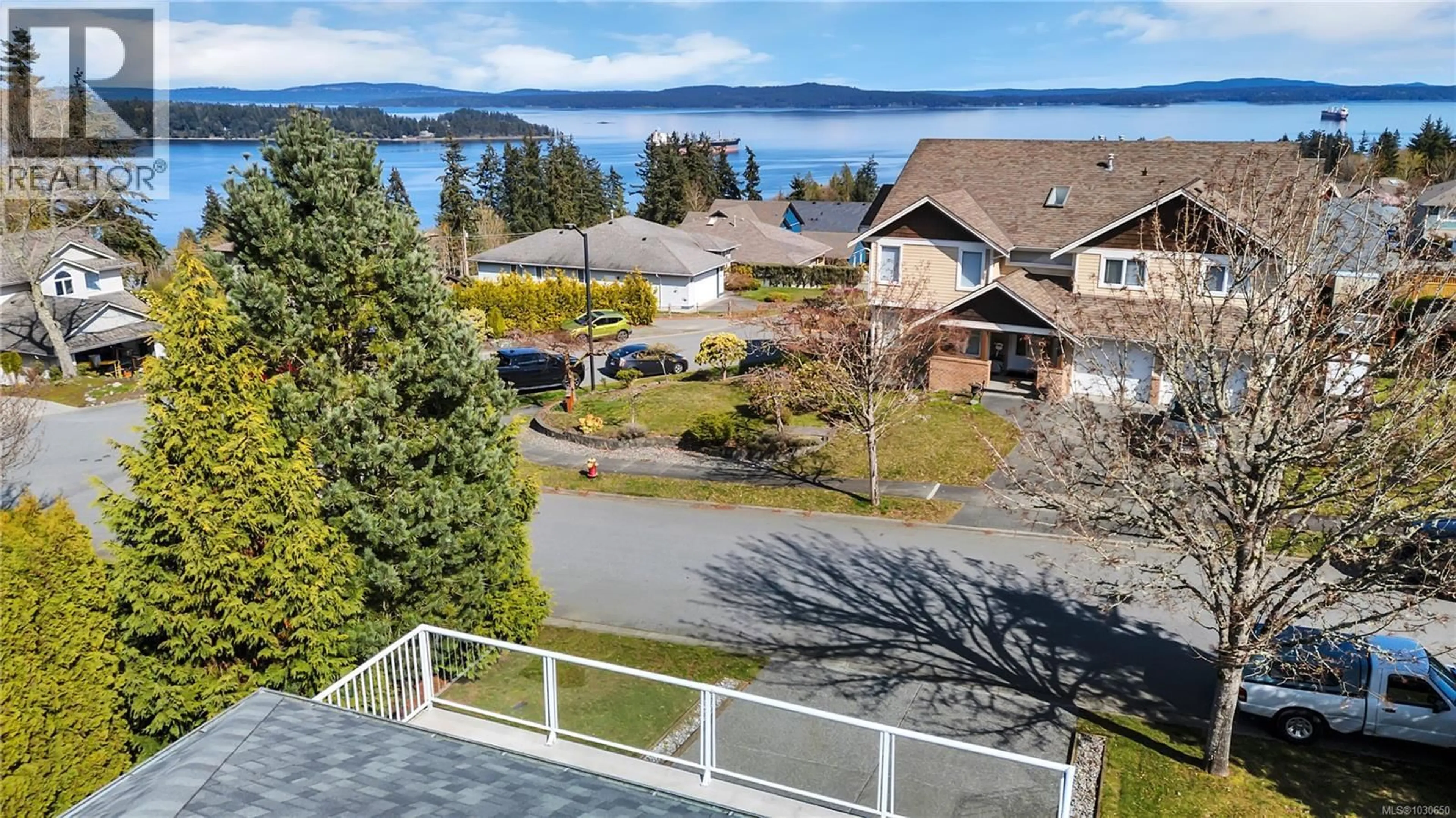 A pic from outside/outdoor area/front of a property/back of a property/a pic from drone, water/lake/river/ocean view for 402 TASSIN PLACE, Ladysmith British Columbia V9G1W8