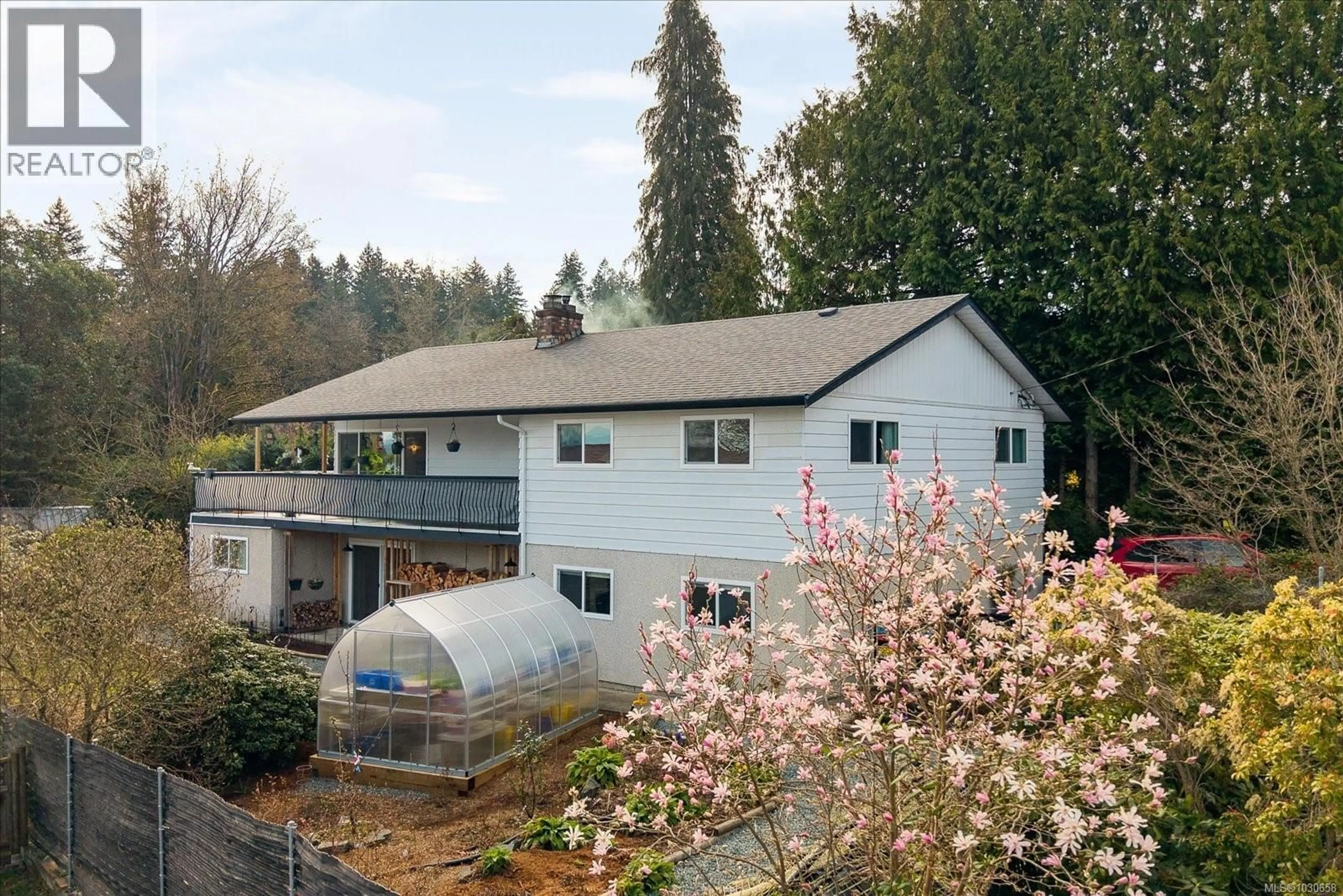 A pic from outside/outdoor area/front of a property/back of a property/a pic from drone, unknown for 11041 CHEMAINUS ROAD, Saltair British Columbia V9G1Z2