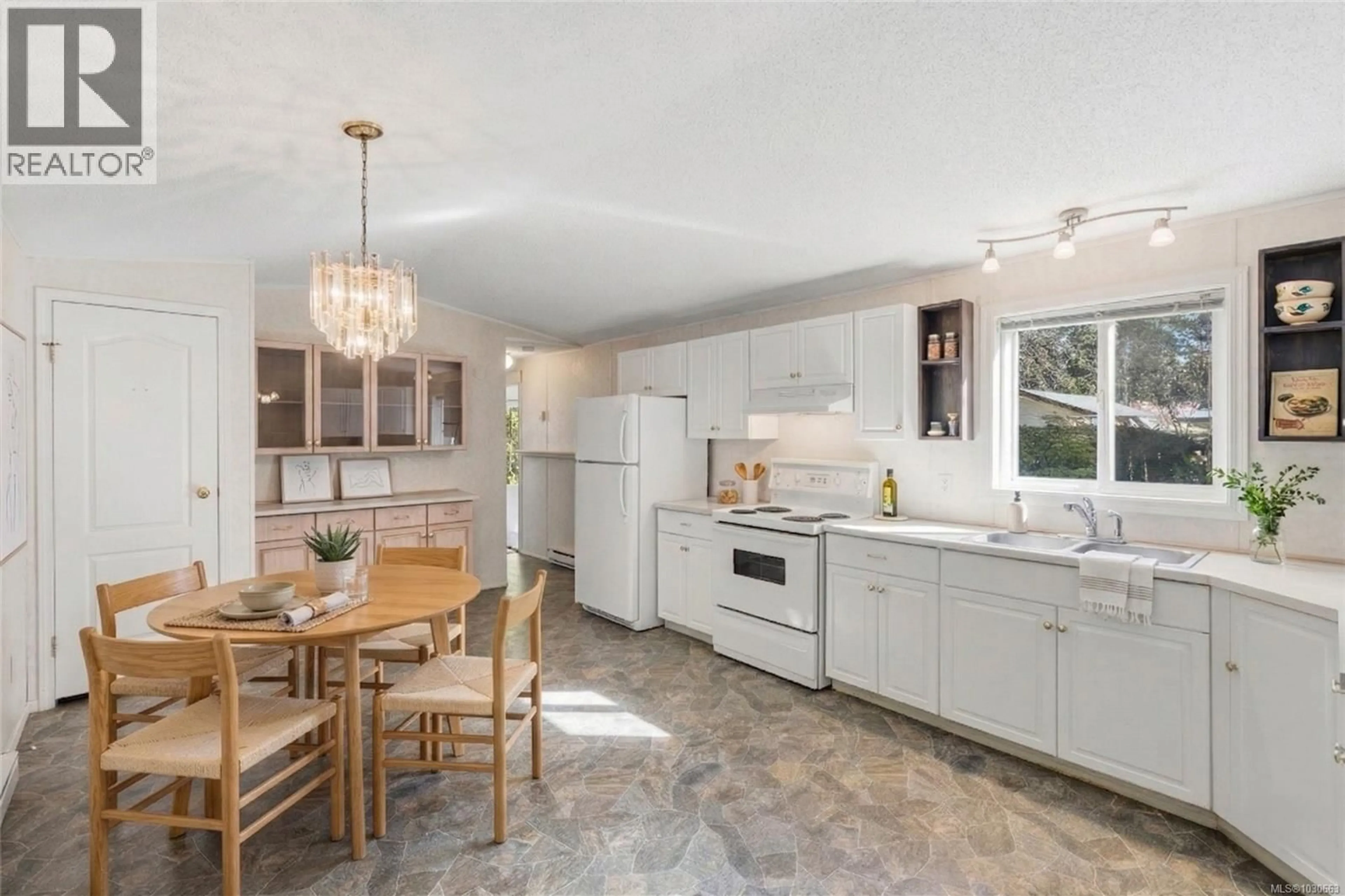 Open concept kitchen, ceramic/tile floor for 850 CARSON ROAD, Qualicum Beach British Columbia V9K1X8