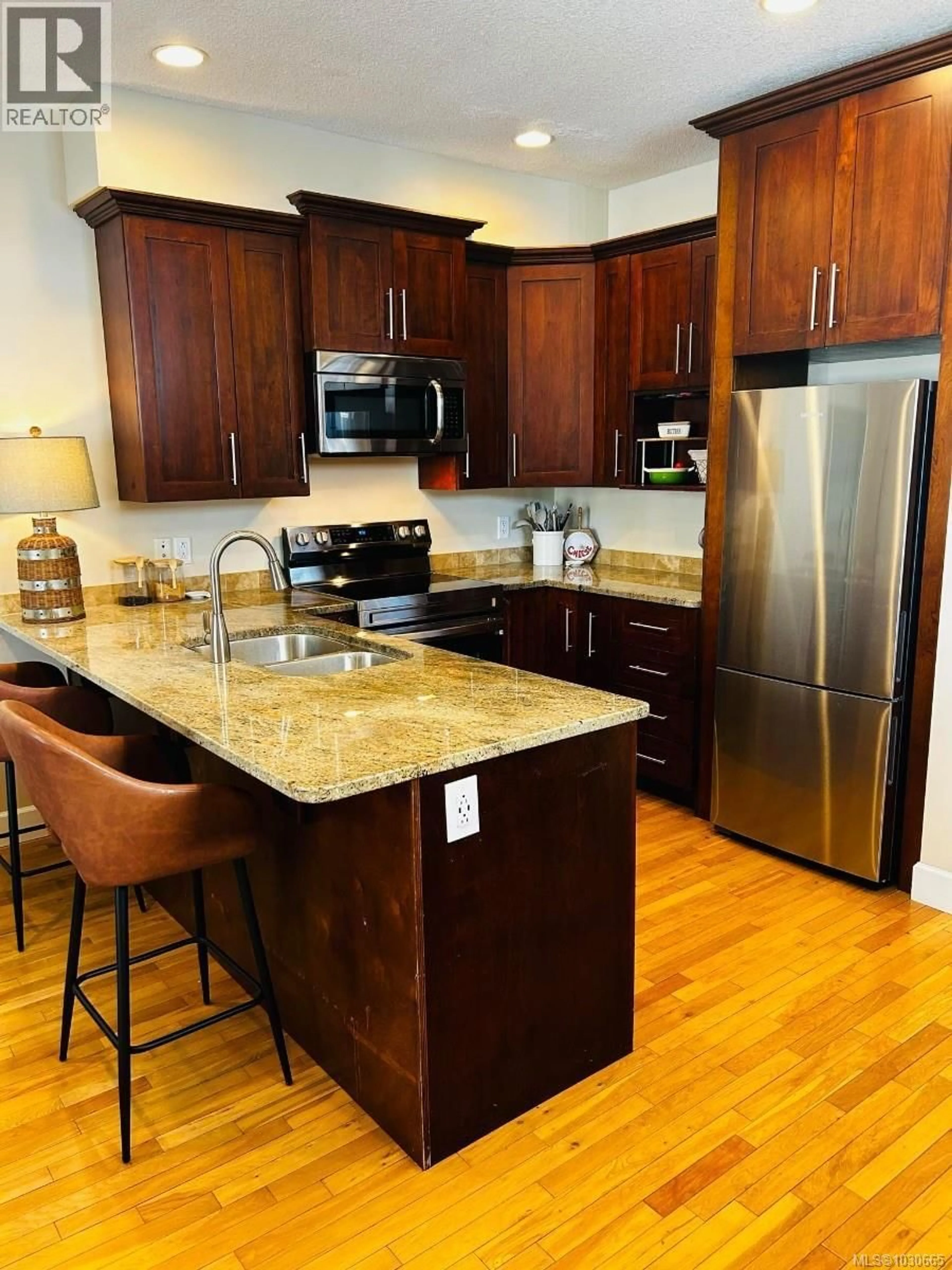 Open concept kitchen, unknown for 111 - 6057 DOUMONT ROAD, Nanaimo British Columbia V9T0G3