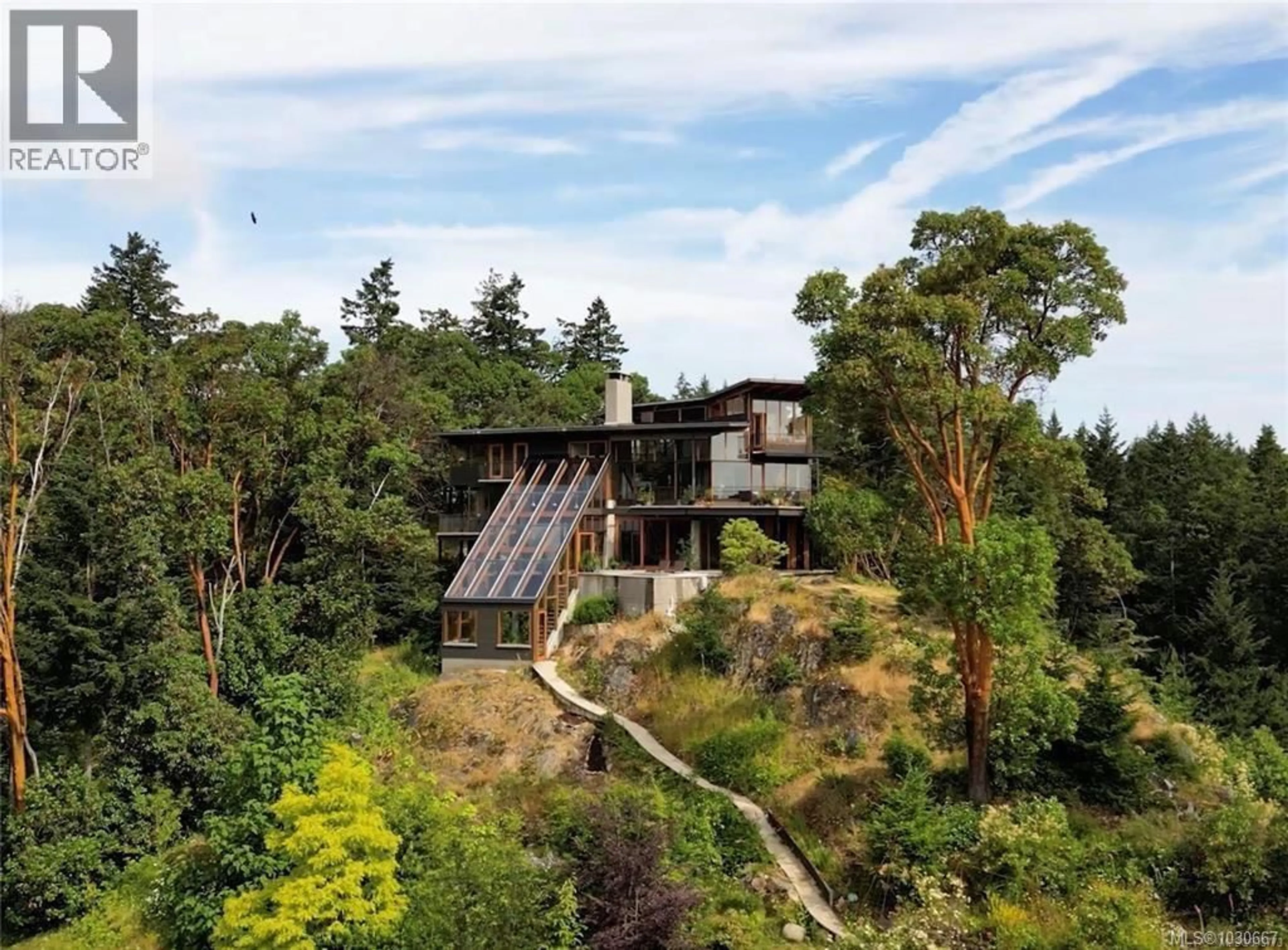 A pic from outside/outdoor area/front of a property/back of a property/a pic from drone, forest/trees view for 122 JASPER ROAD, Salt Spring British Columbia V8K2X8