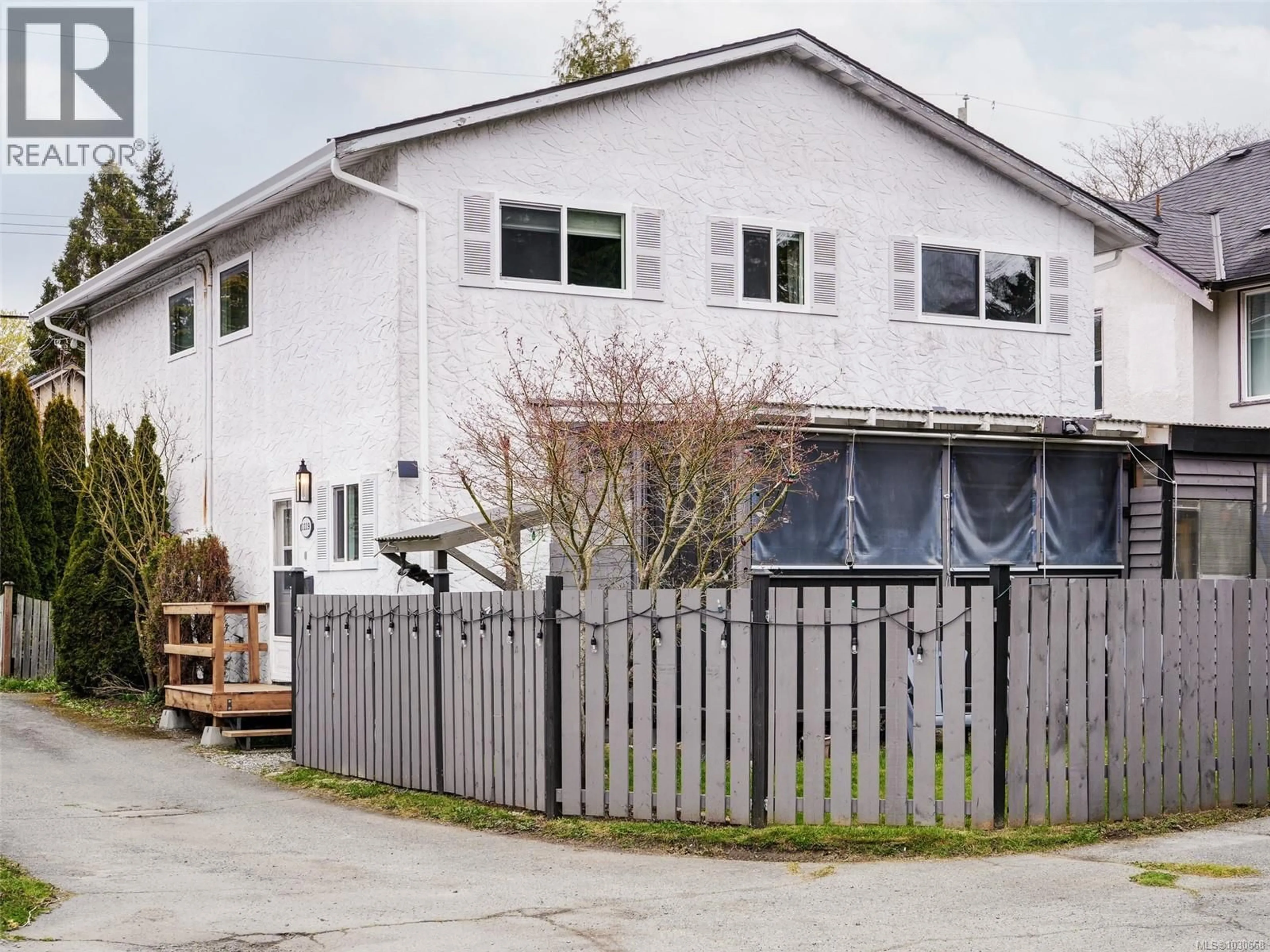 Home with vinyl exterior material, street for 1119 WYCHBURY AVENUE, Esquimalt British Columbia V9A5K9