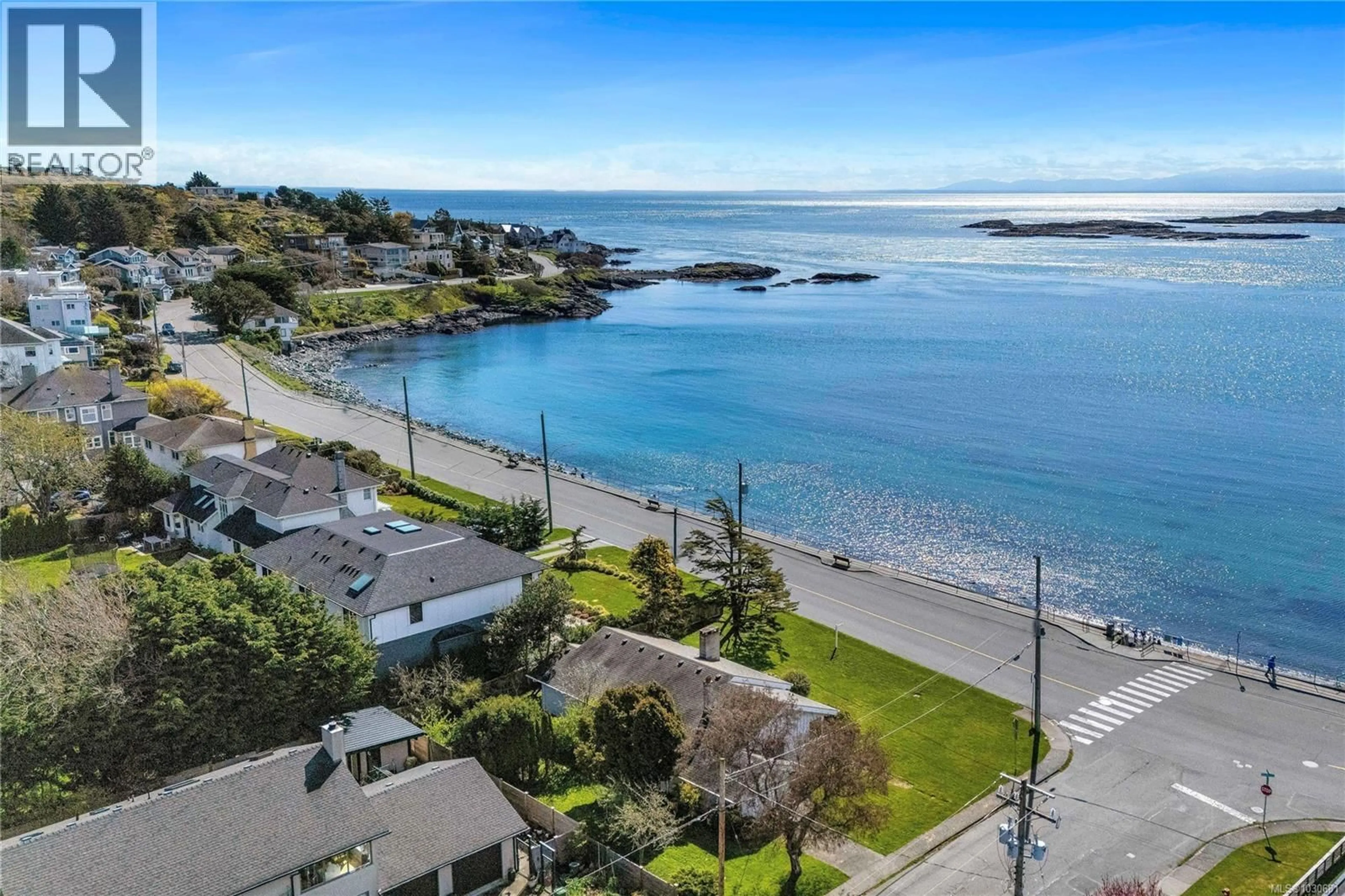 A pic from outside/outdoor area/front of a property/back of a property/a pic from drone, water/lake/river/ocean view for 406 BEACH DRIVE, Oak Bay British Columbia V8S2M4