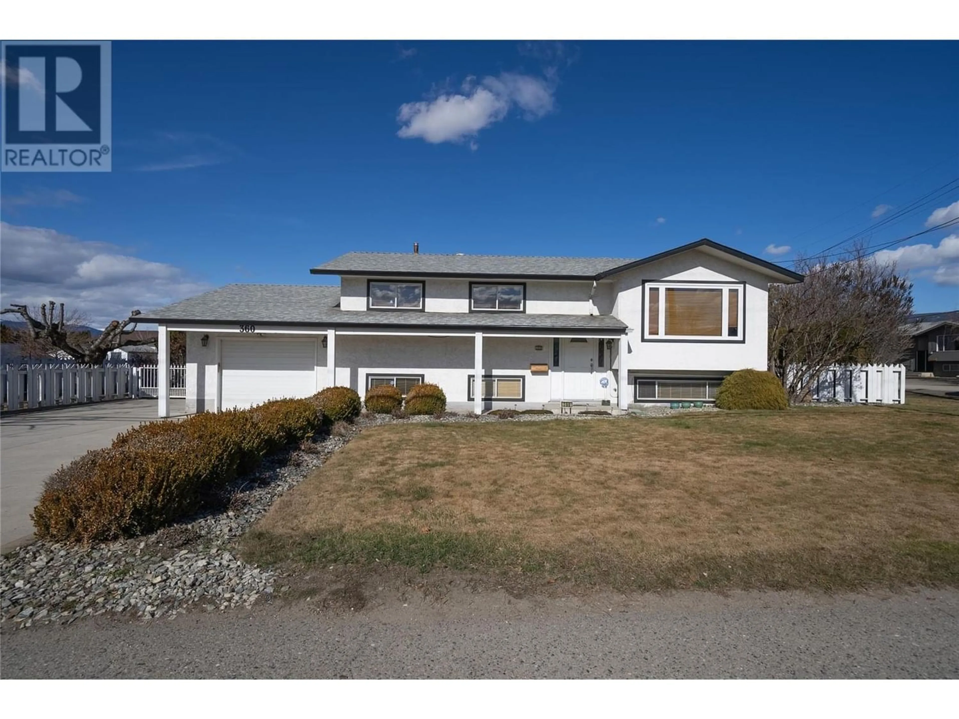 Frontside or backside of a home, the street view for 360 McCurdy Road, Kelowna British Columbia V1X2P3