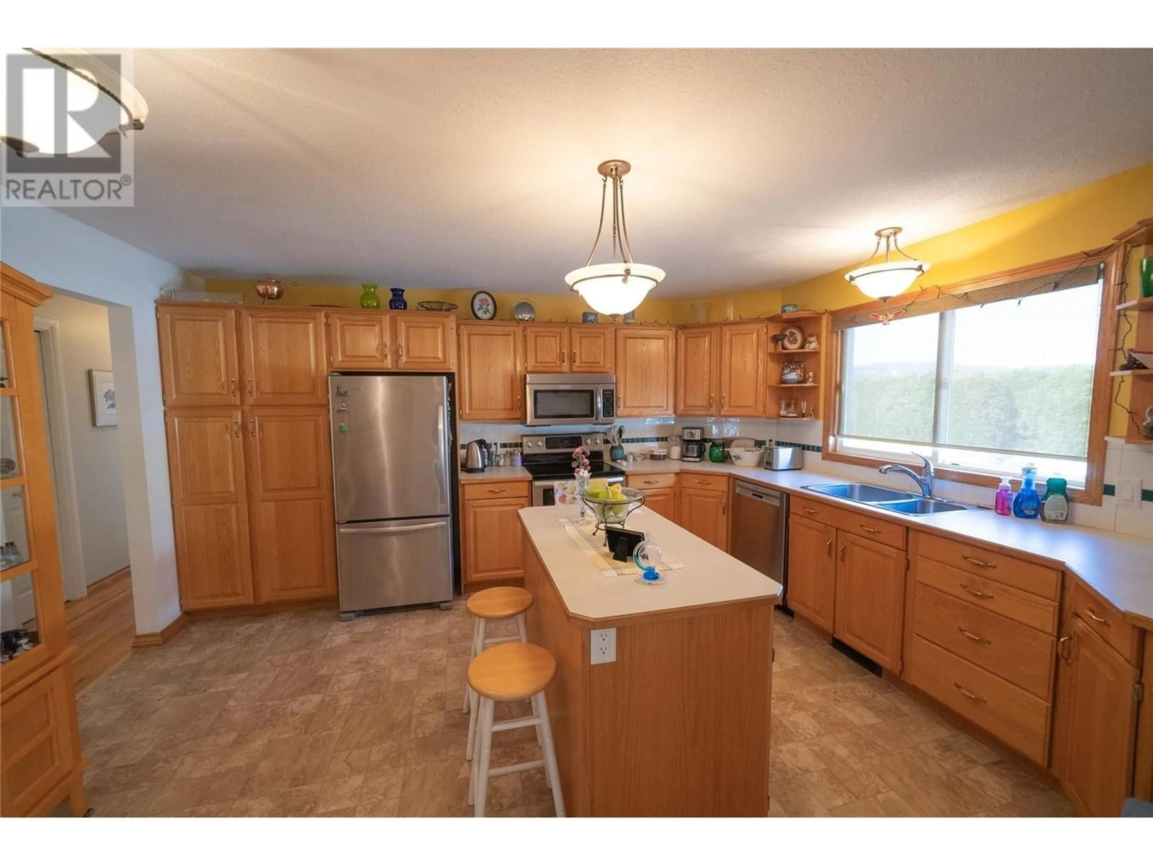 Kitchen, wood floors, cottage for 360 McCurdy Road, Kelowna British Columbia V1X2P3