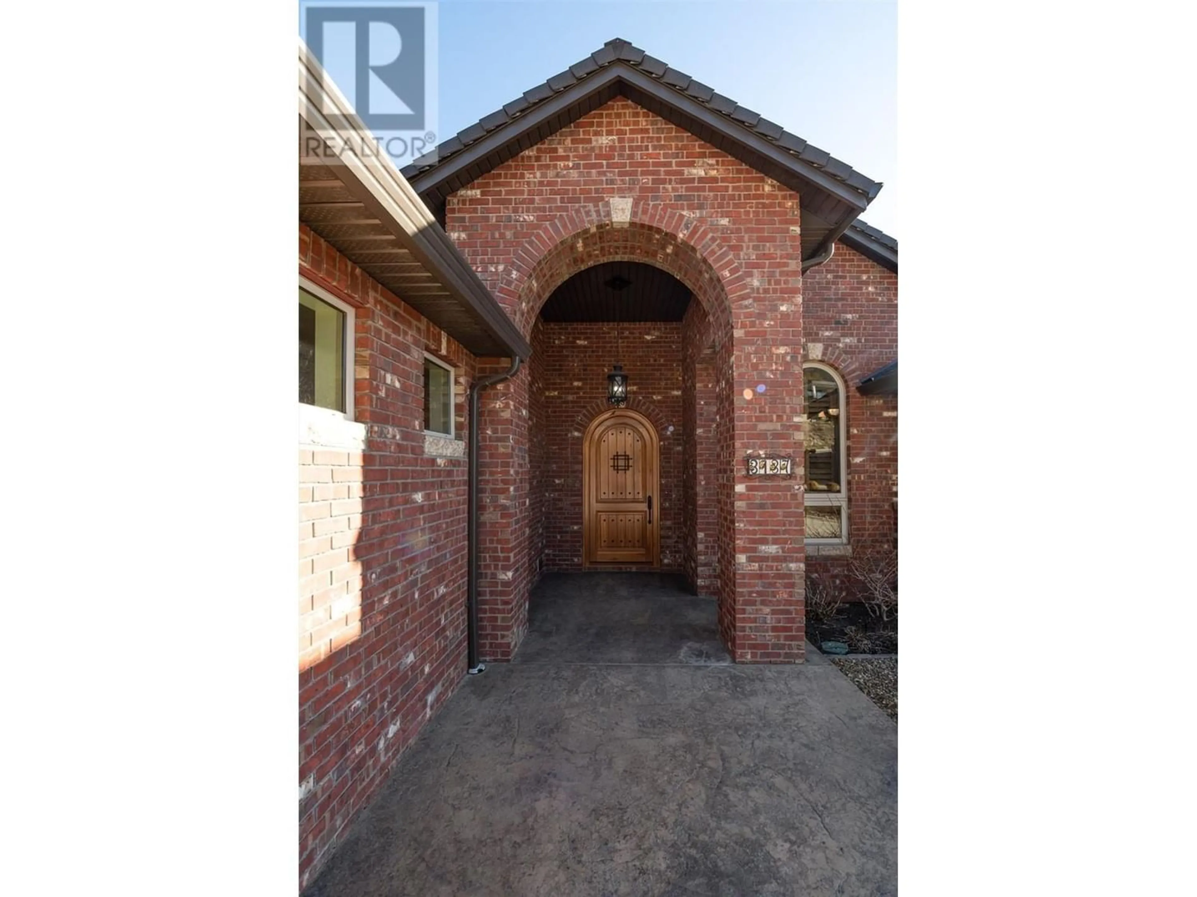 Home with brick exterior material for 3137 Pinot Noir Place, West Kelowna British Columbia V4T3H9