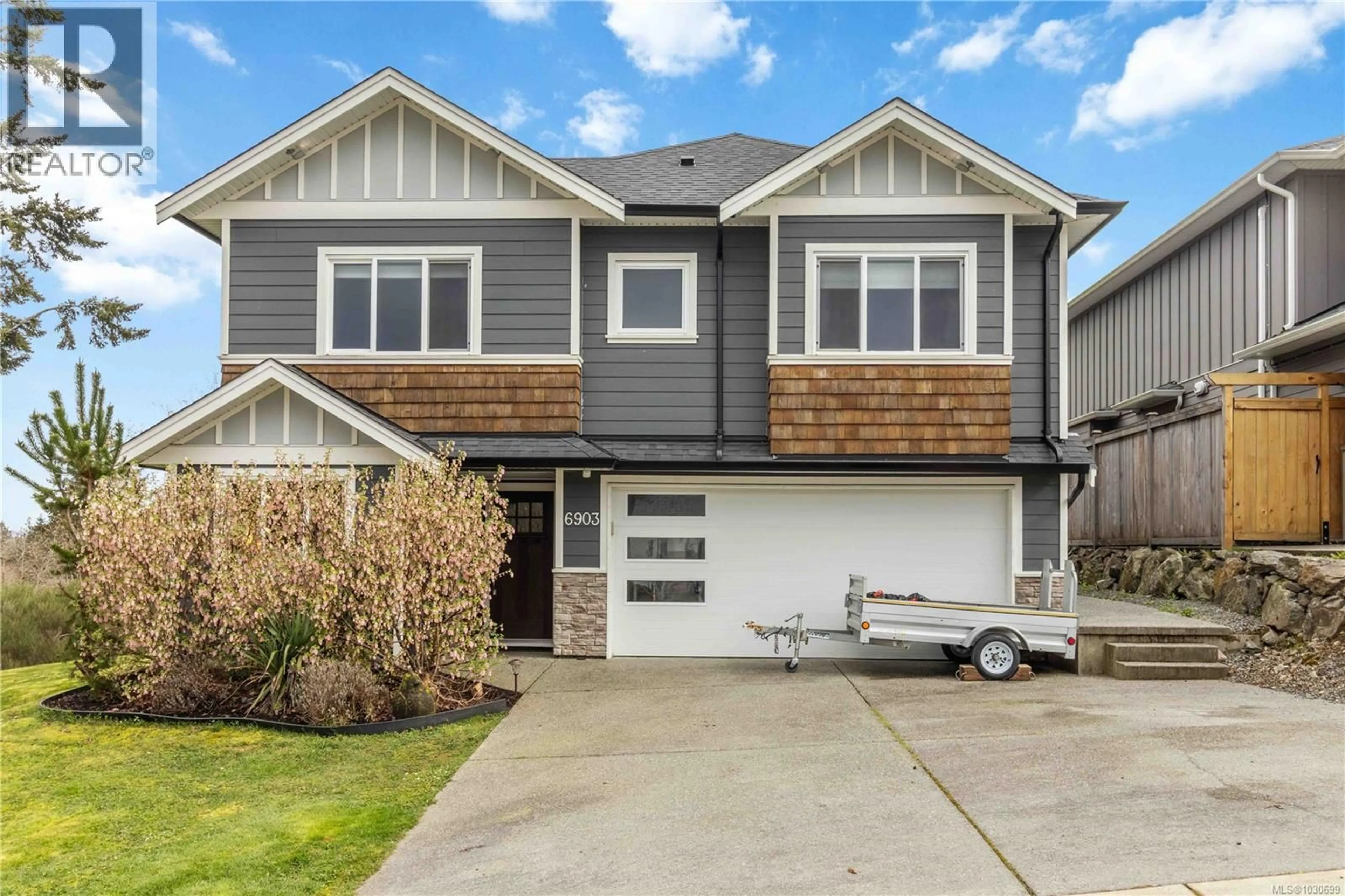 Home with vinyl exterior material, street for 6903 BURR DRIVE, Sooke British Columbia V9Z0L1