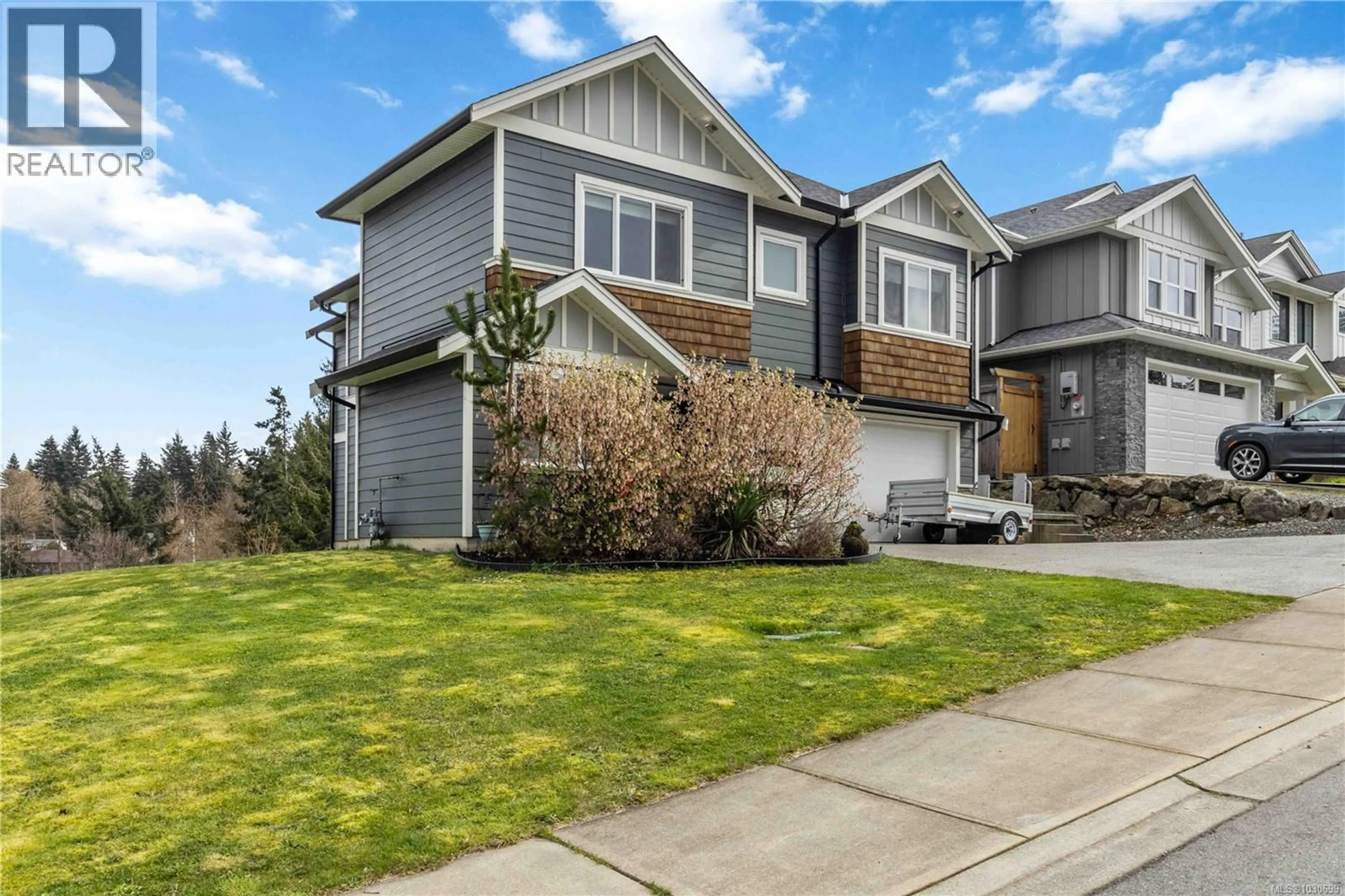 Home with vinyl exterior material, street for 6903 BURR DRIVE, Sooke British Columbia V9Z0L1