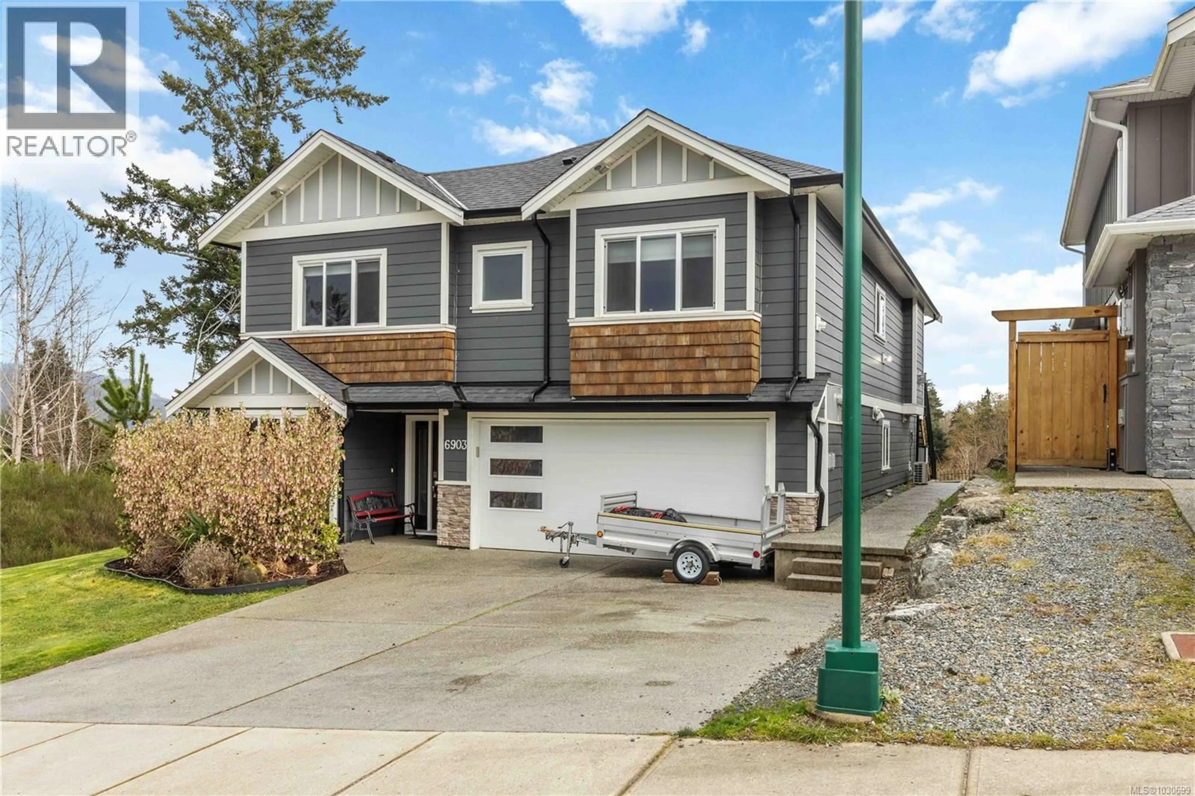 Home with vinyl exterior material, street for 6903 BURR DRIVE, Sooke British Columbia V9Z0L1