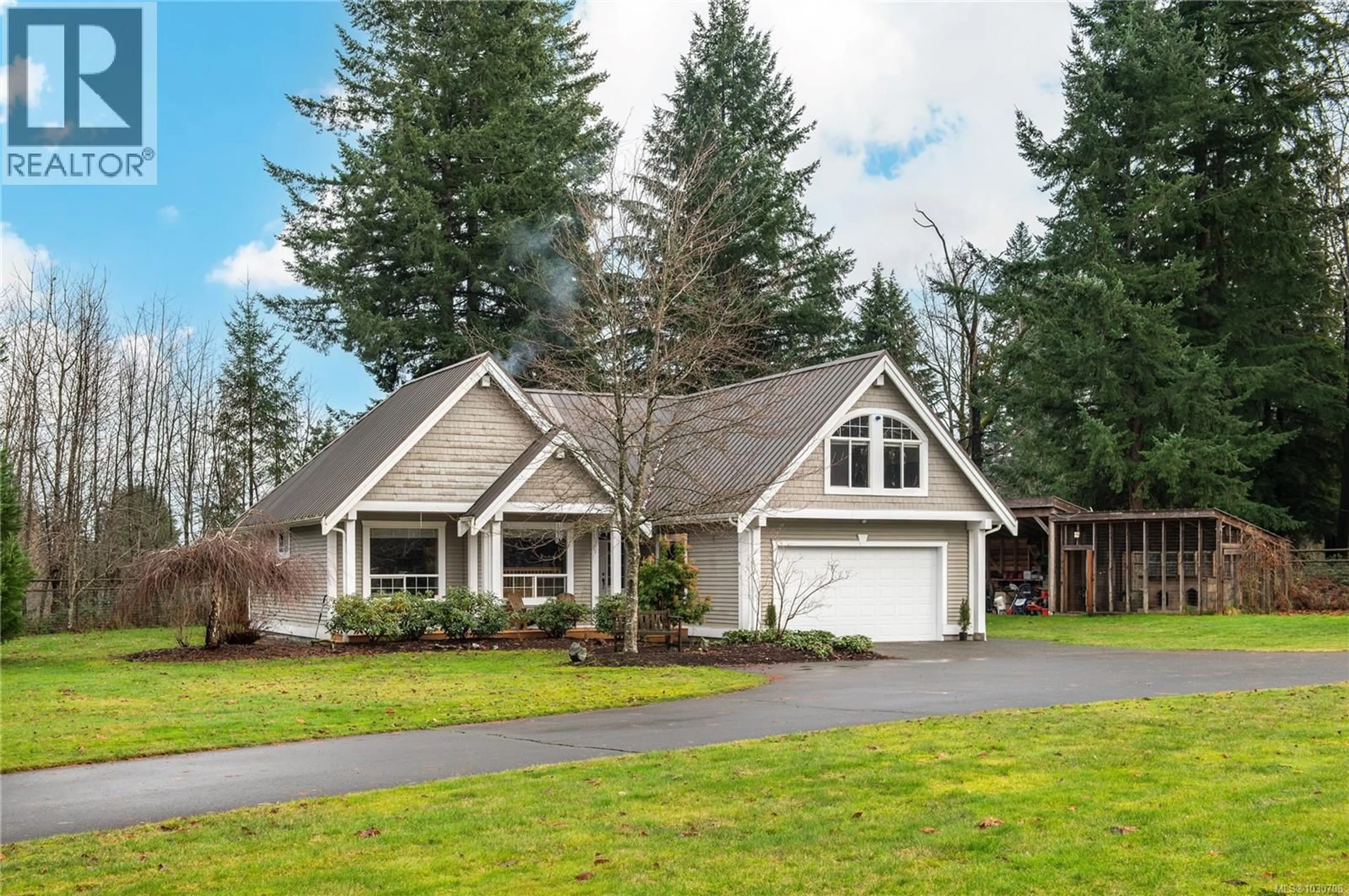 Home with vinyl exterior material, street for 2435 CHARLEVILLE ROAD, Campbell River British Columbia V9W4N4