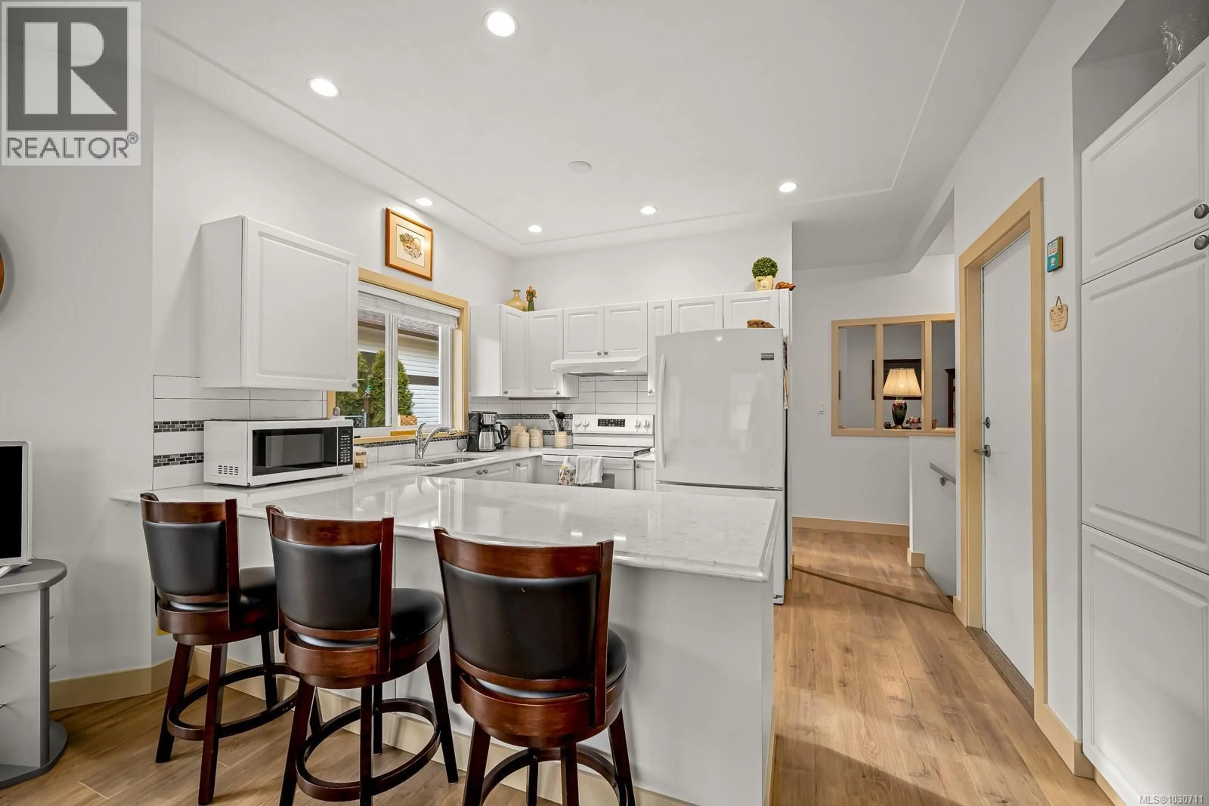 Open concept kitchen, unknown for 402 - 2727 1ST STREET, Courtenay British Columbia V9N9C8