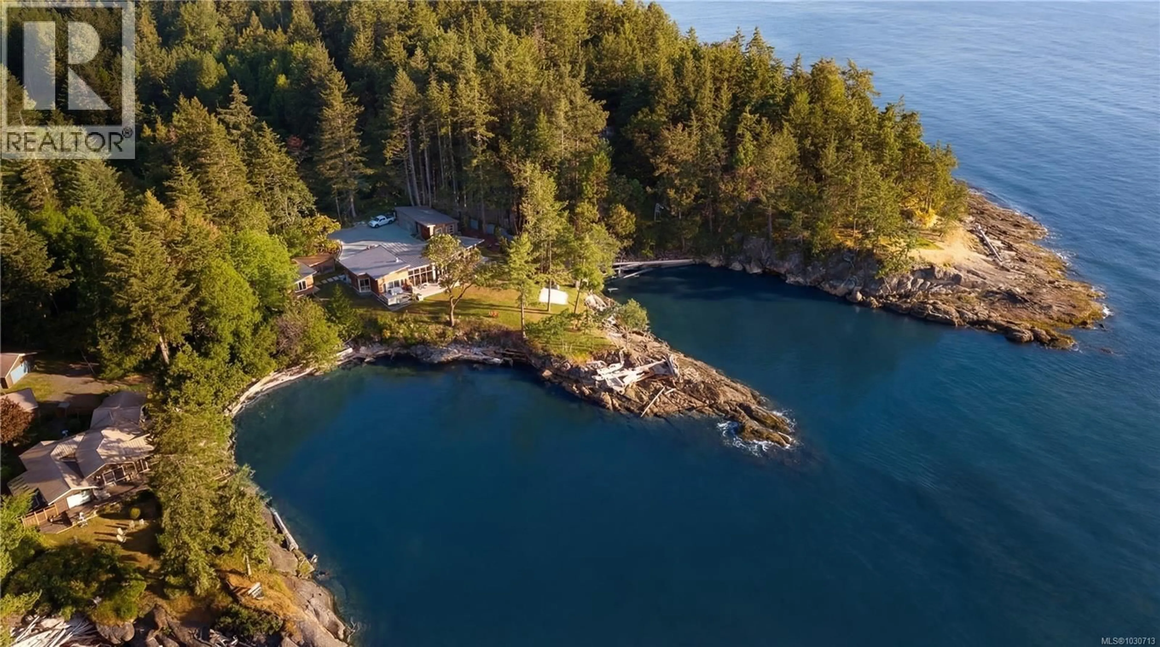 A pic from outside/outdoor area/front of a property/back of a property/a pic from drone, water/lake/river/ocean view for 236 GULF DRIVE, Galiano Island British Columbia V0N1P0