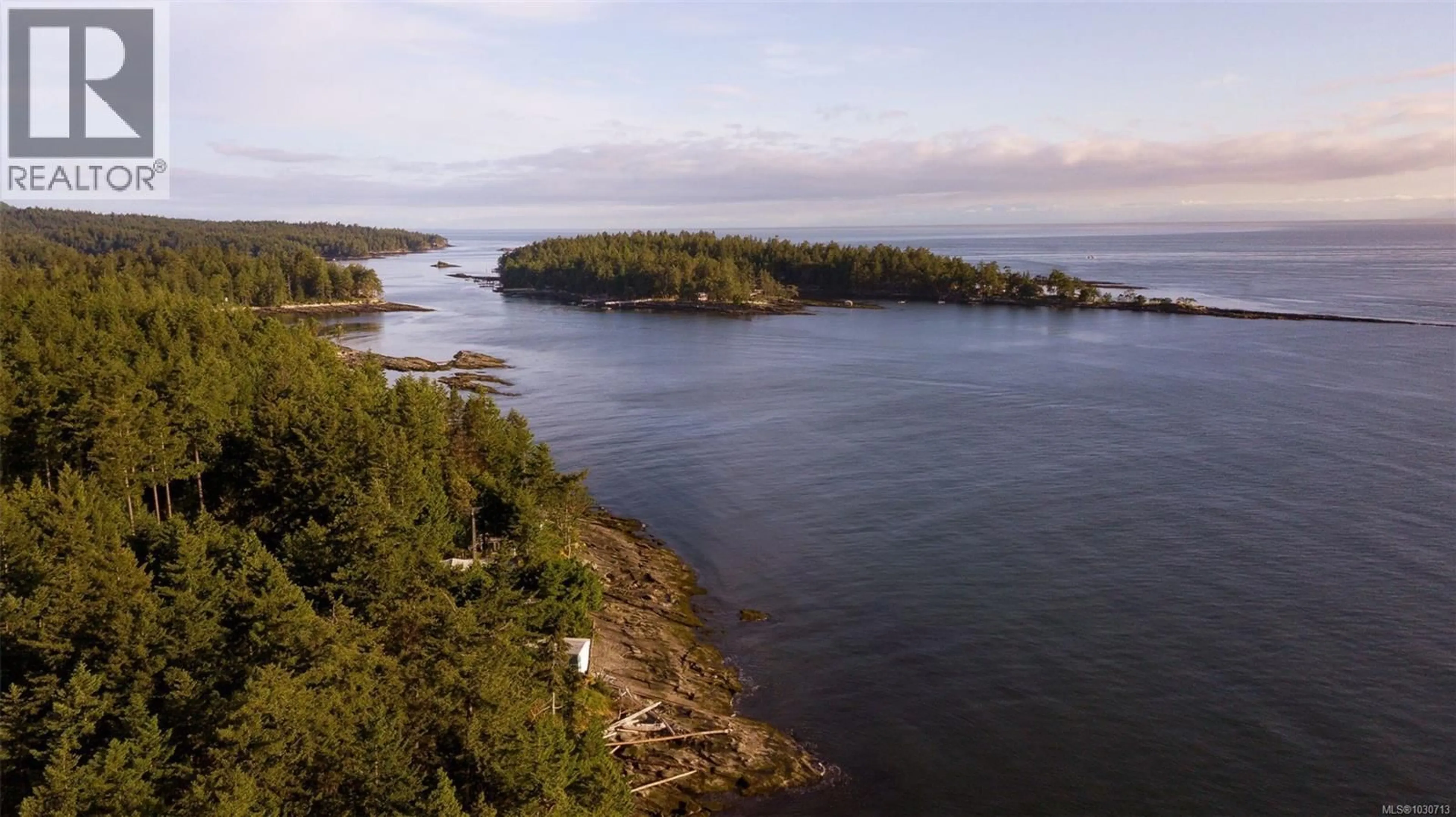 A pic from outside/outdoor area/front of a property/back of a property/a pic from drone, water/lake/river/ocean view for 236 GULF DRIVE, Galiano Island British Columbia V0N1P0
