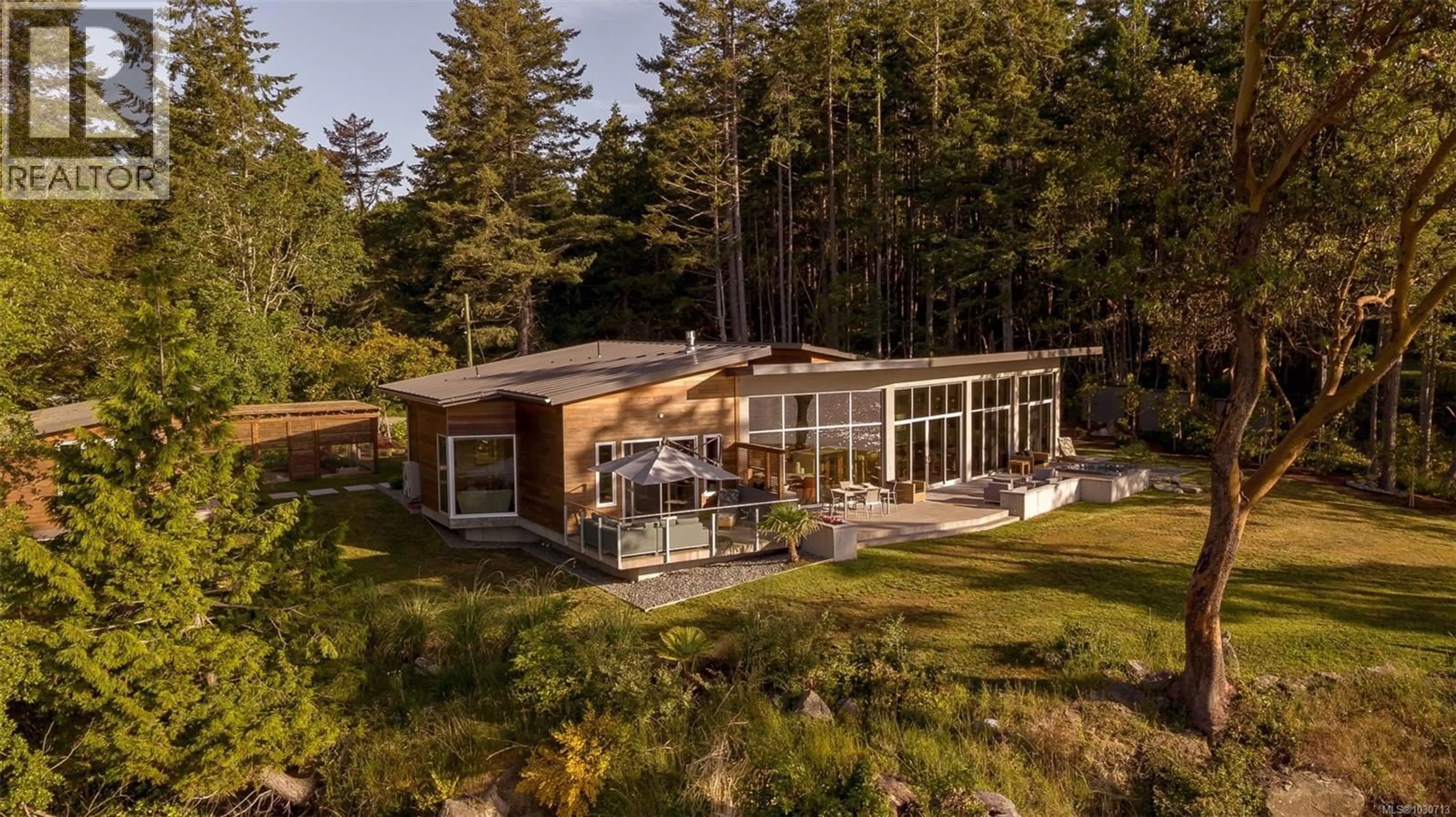 A pic from outside/outdoor area/front of a property/back of a property/a pic from drone, water/lake/river/ocean view for 236 GULF DRIVE, Galiano Island British Columbia V0N1P0