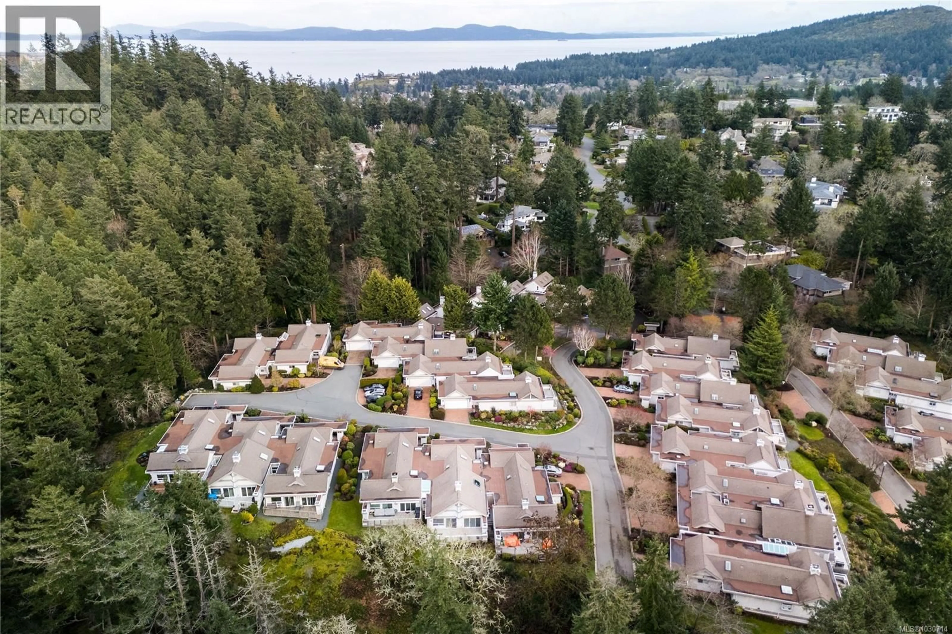 A pic from outside/outdoor area/front of a property/back of a property/a pic from drone, water/lake/river/ocean view for 20 - 928 BEARWOOD LANE, Saanich British Columbia V8Y3G8