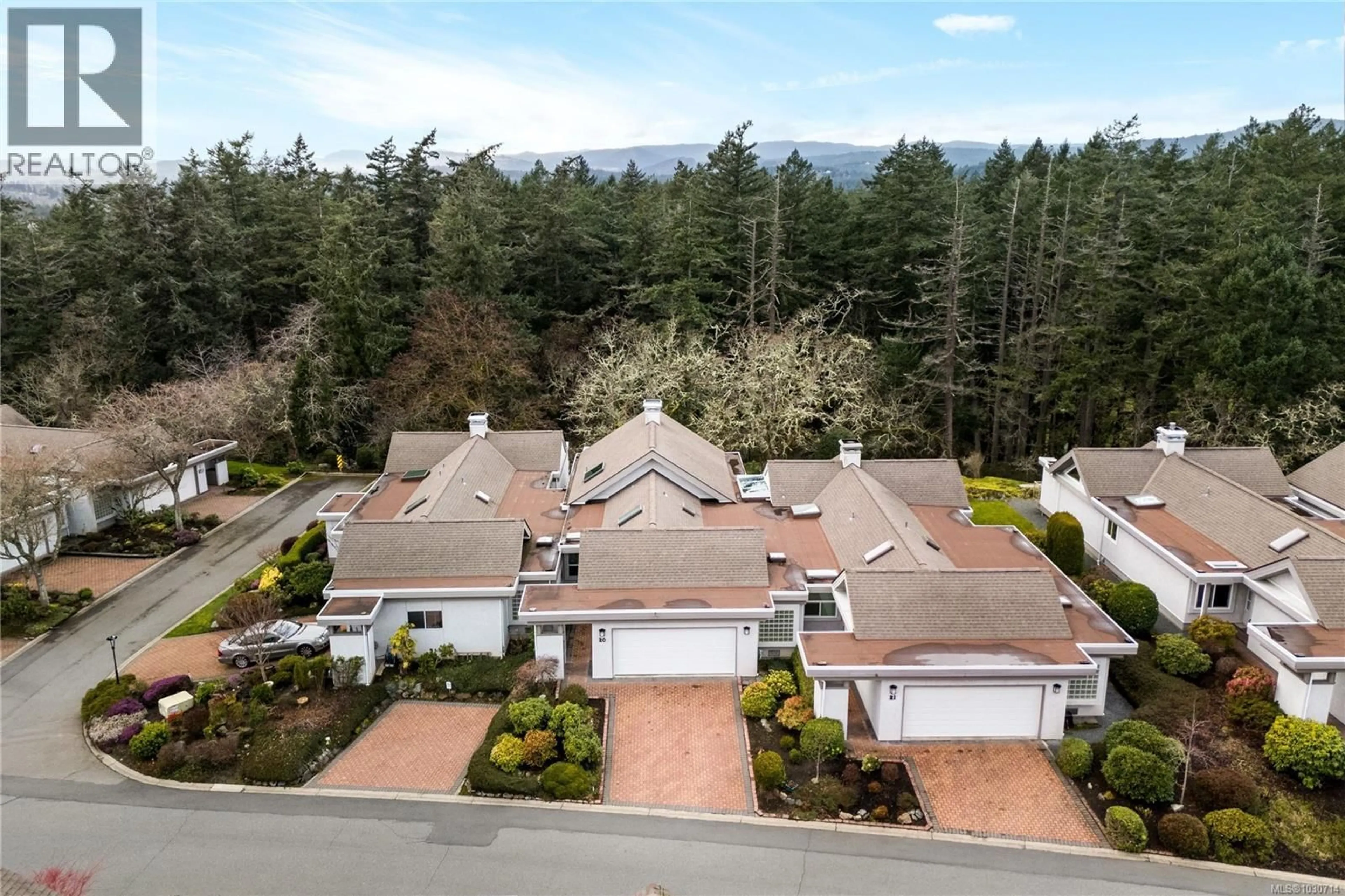 A pic from outside/outdoor area/front of a property/back of a property/a pic from drone, mountain view for 20 - 928 BEARWOOD LANE, Saanich British Columbia V8Y3G8