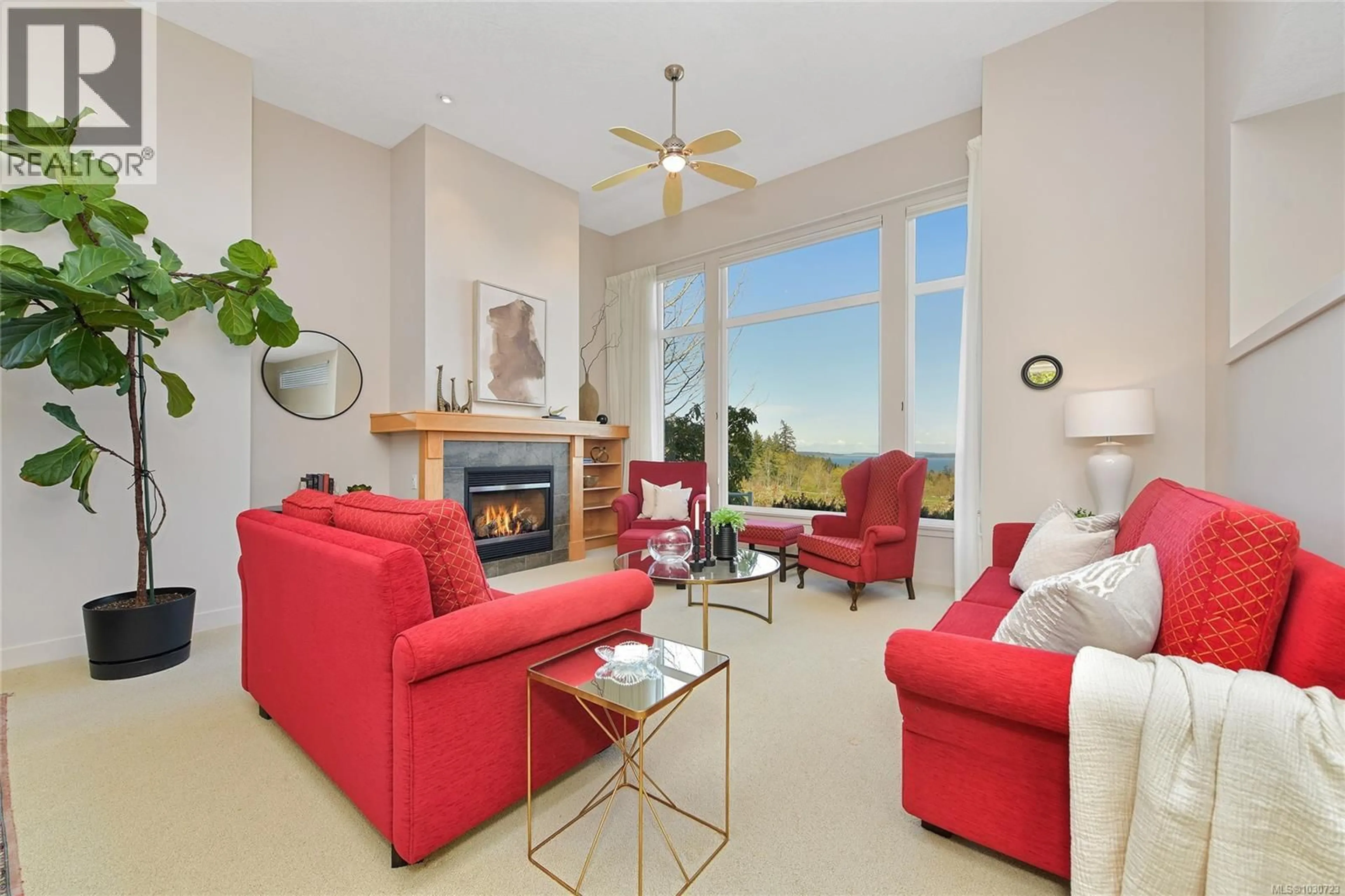 Living room with furniture, ceramic/tile floor for 5392 SAYWARD HILL CRESCENT, Saanich British Columbia V8Y3H8