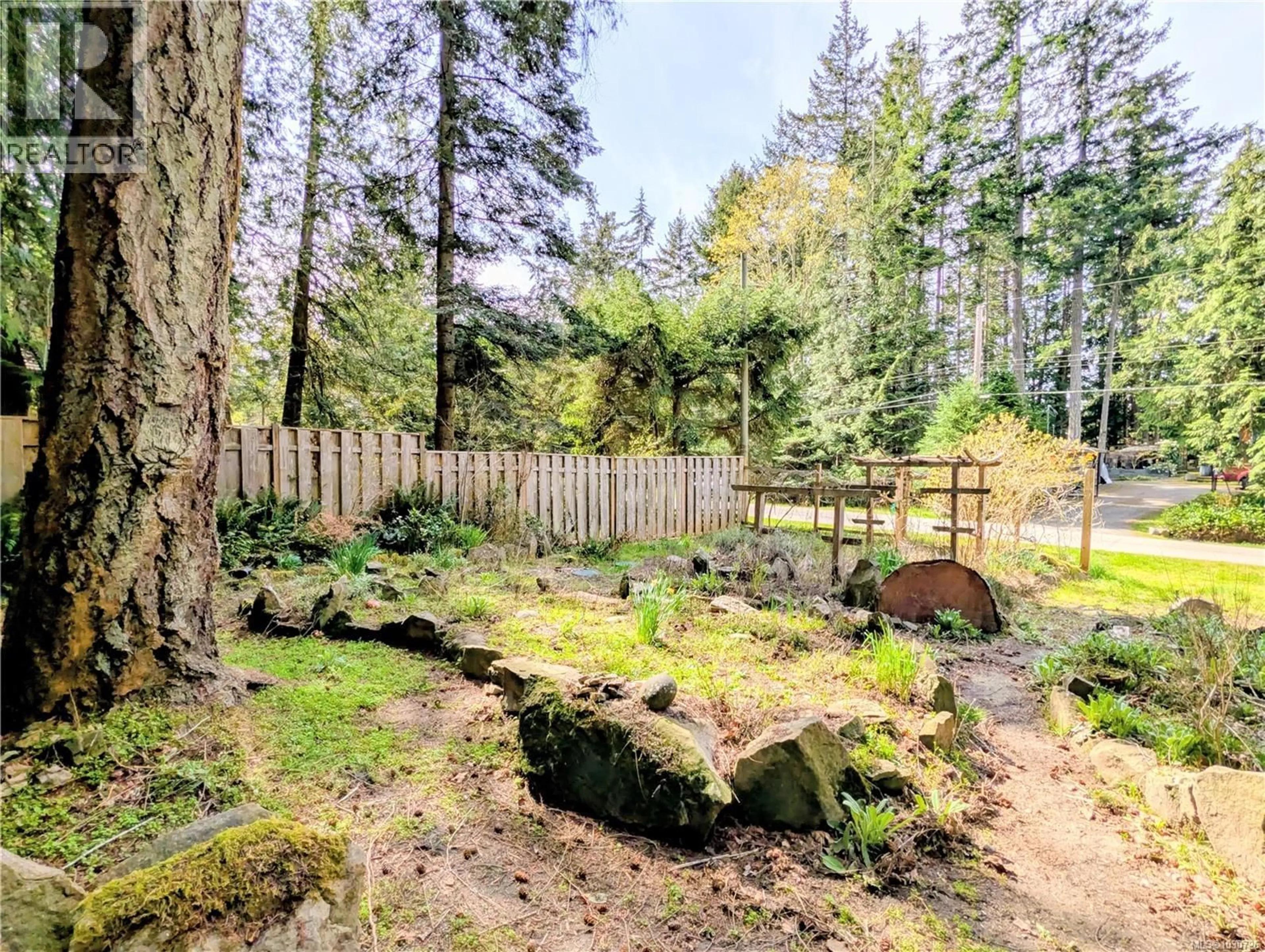 A pic from outside/outdoor area/front of a property/back of a property/a pic from drone, forest/trees view for 948 HARRISON WAY, Gabriola Island British Columbia V0R1X2