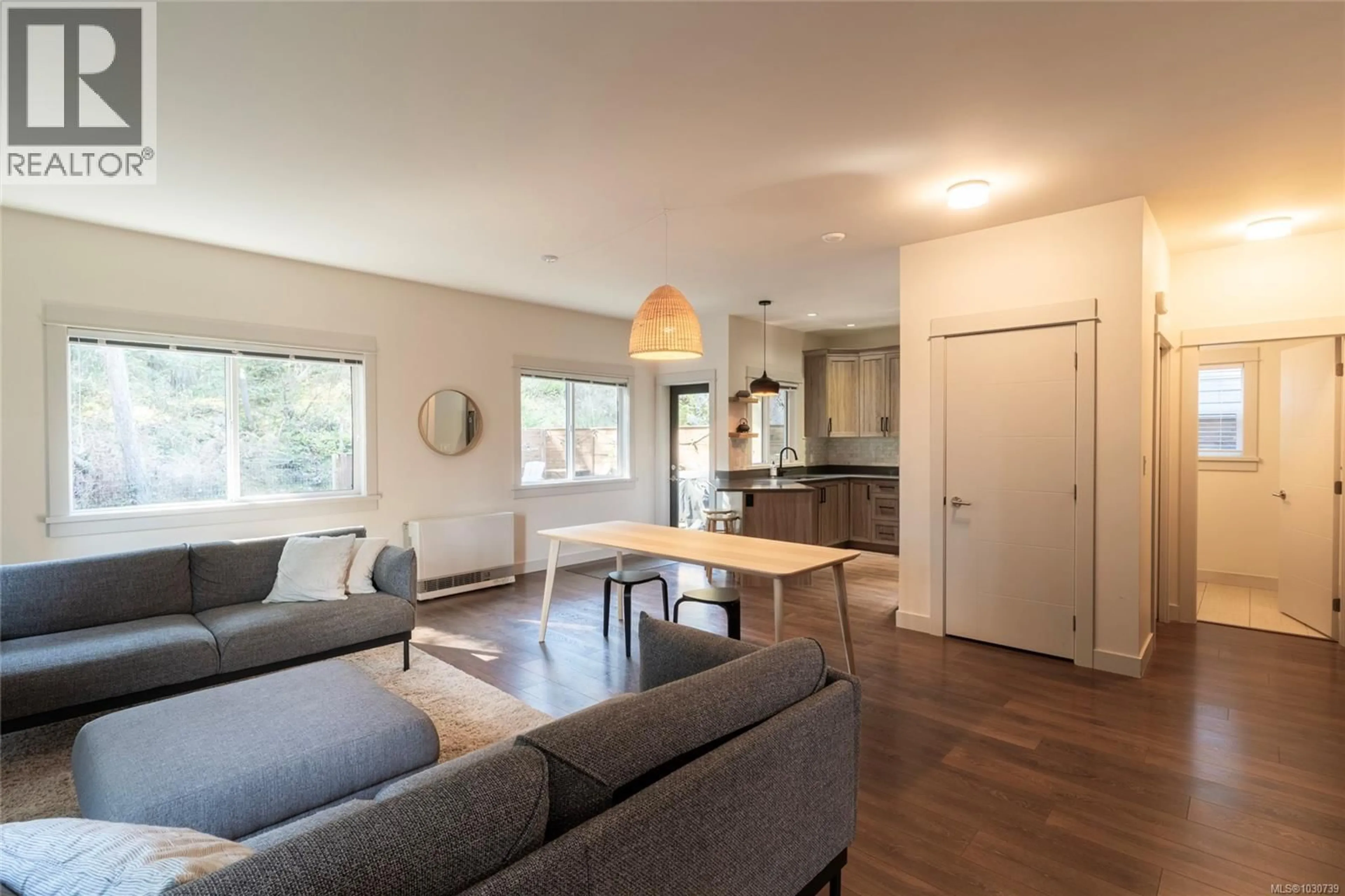 Living room with furniture, wood/laminate floor for 2398 LUND ROAD, View Royal British Columbia V9B6V5