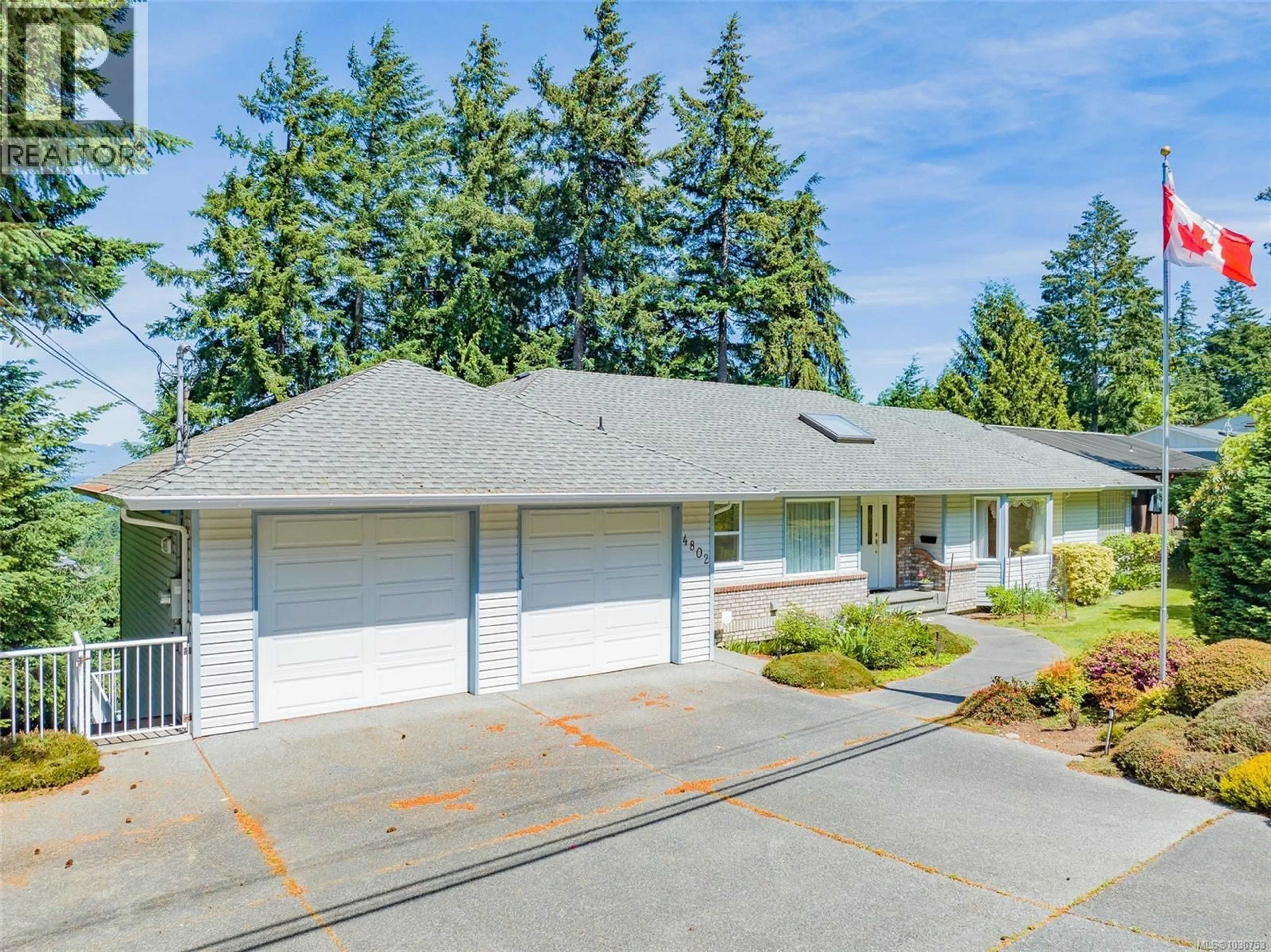 Home with vinyl exterior material, street for 4802 LAGUNA WAY, Nanaimo British Columbia V9T1K5