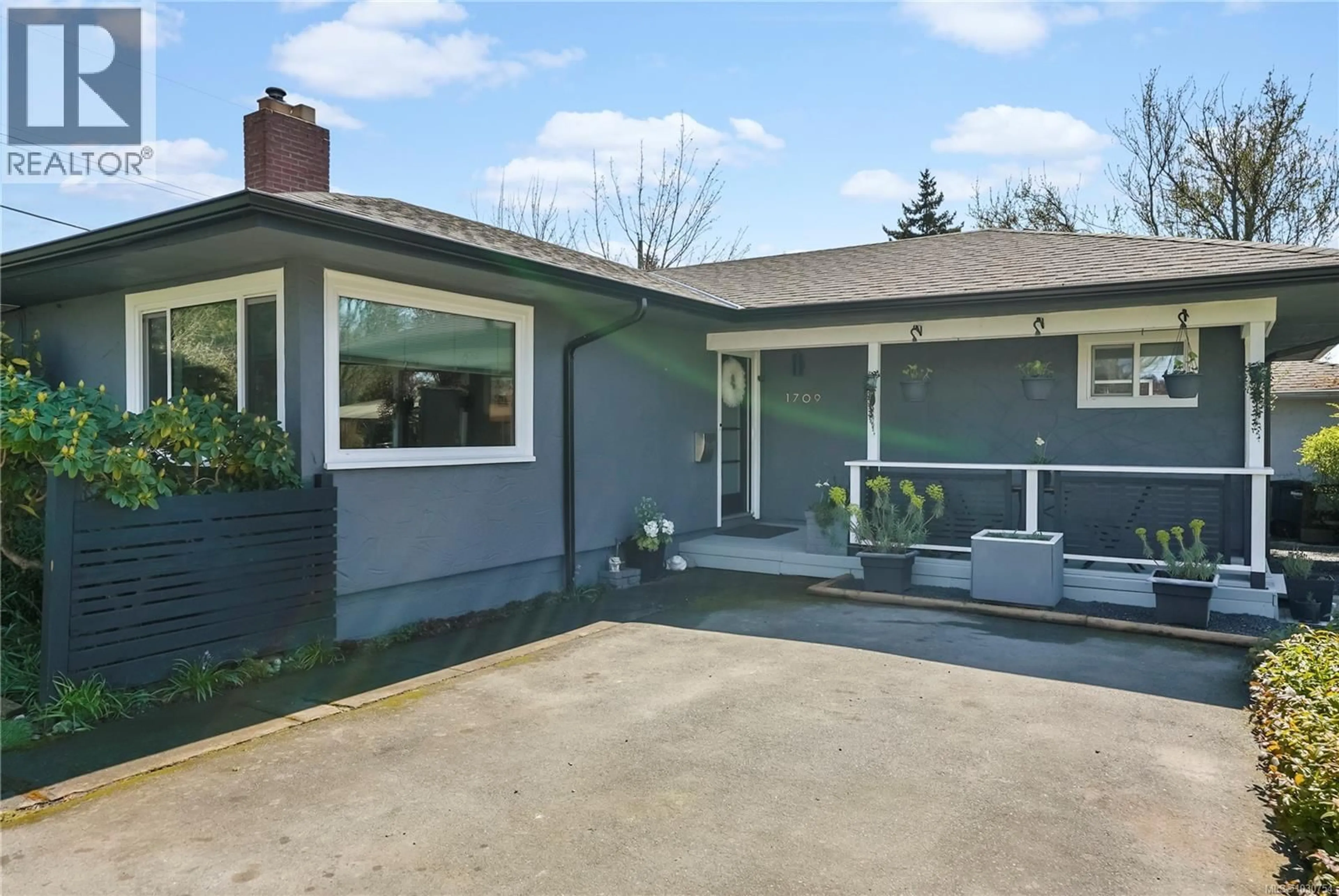Home with vinyl exterior material, street for 1709 MCRAE AVENUE, Saanich British Columbia V8P1H9
