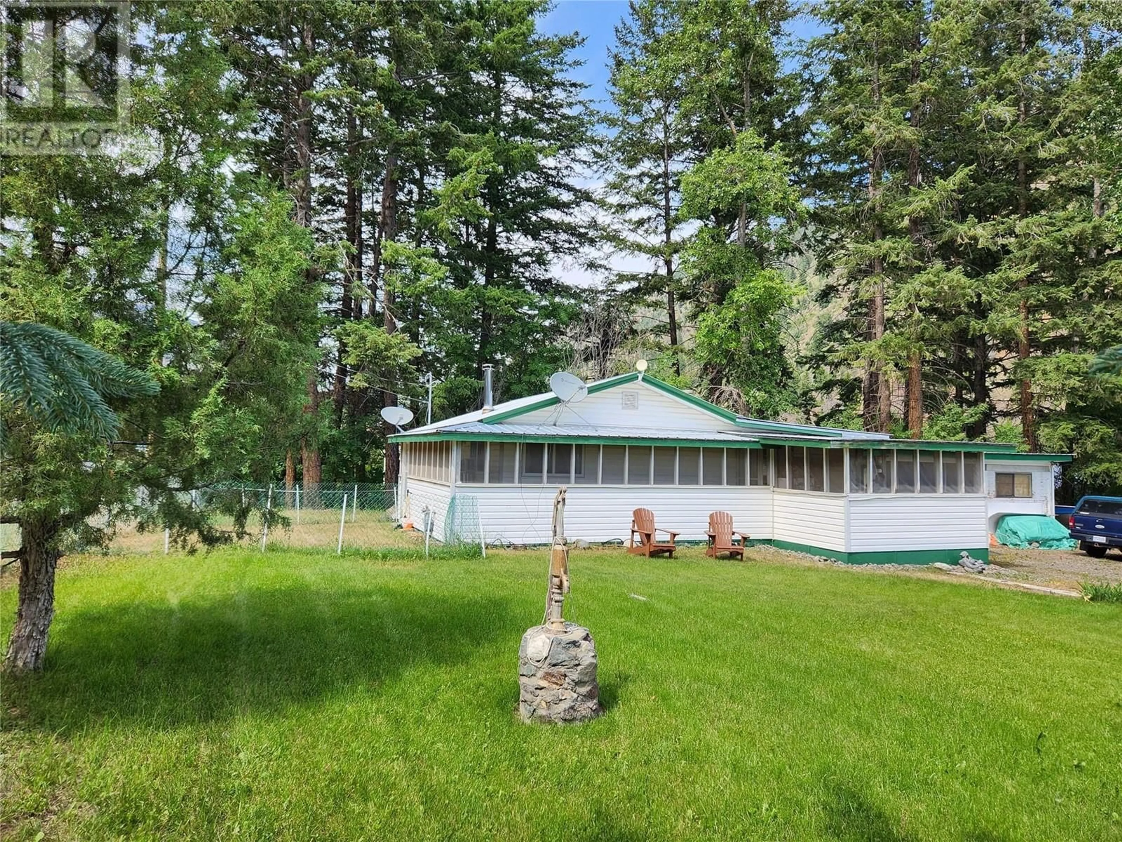 A pic from outside/outdoor area/front of a property/back of a property/a pic from drone, forest/trees view for 1483 MAIN STREET, Olalla British Columbia V0X1N6