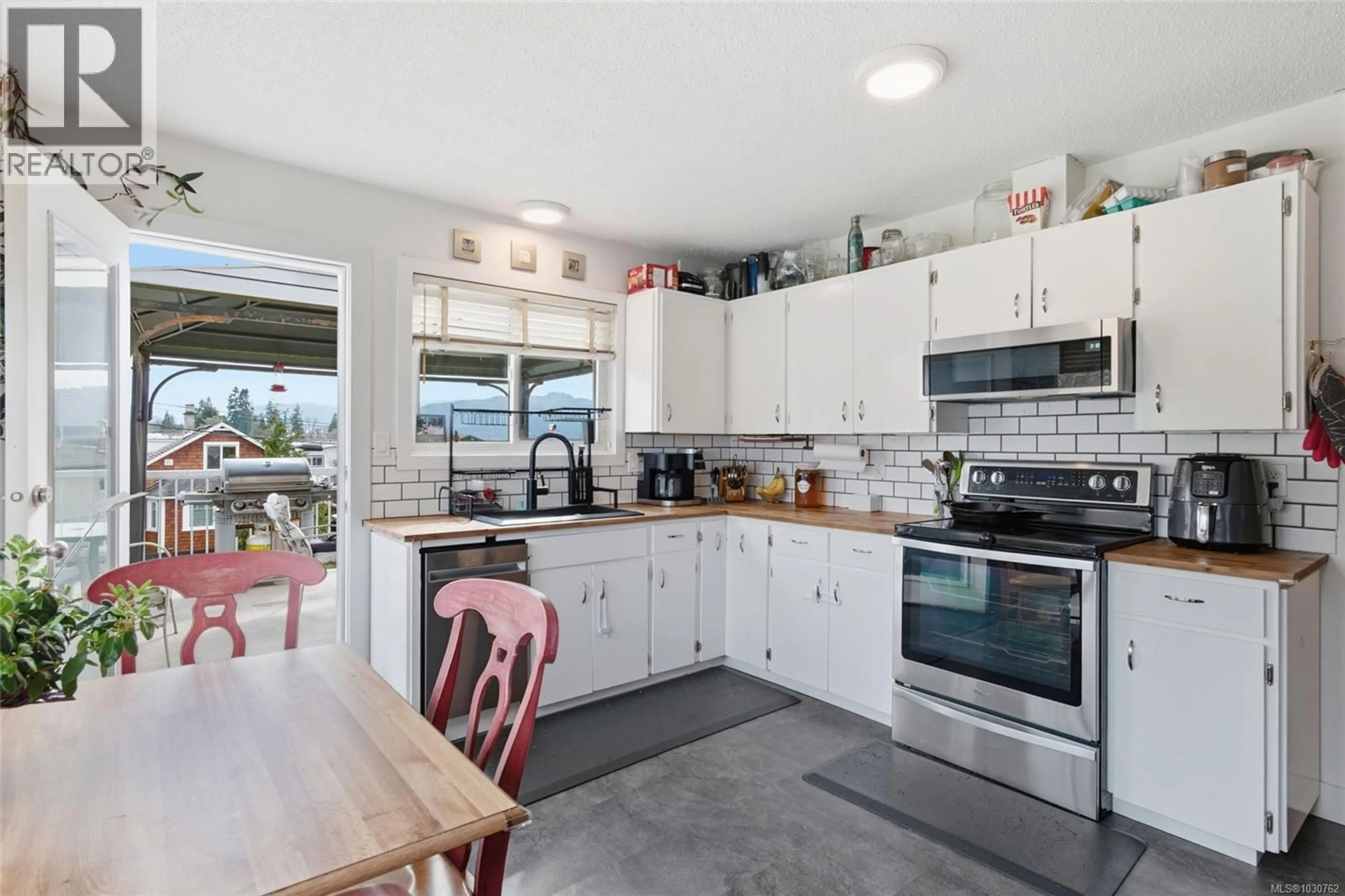 Open concept kitchen, ceramic/tile floor for 4866 MAY STREET, Port Alberni British Columbia V9Y6R7