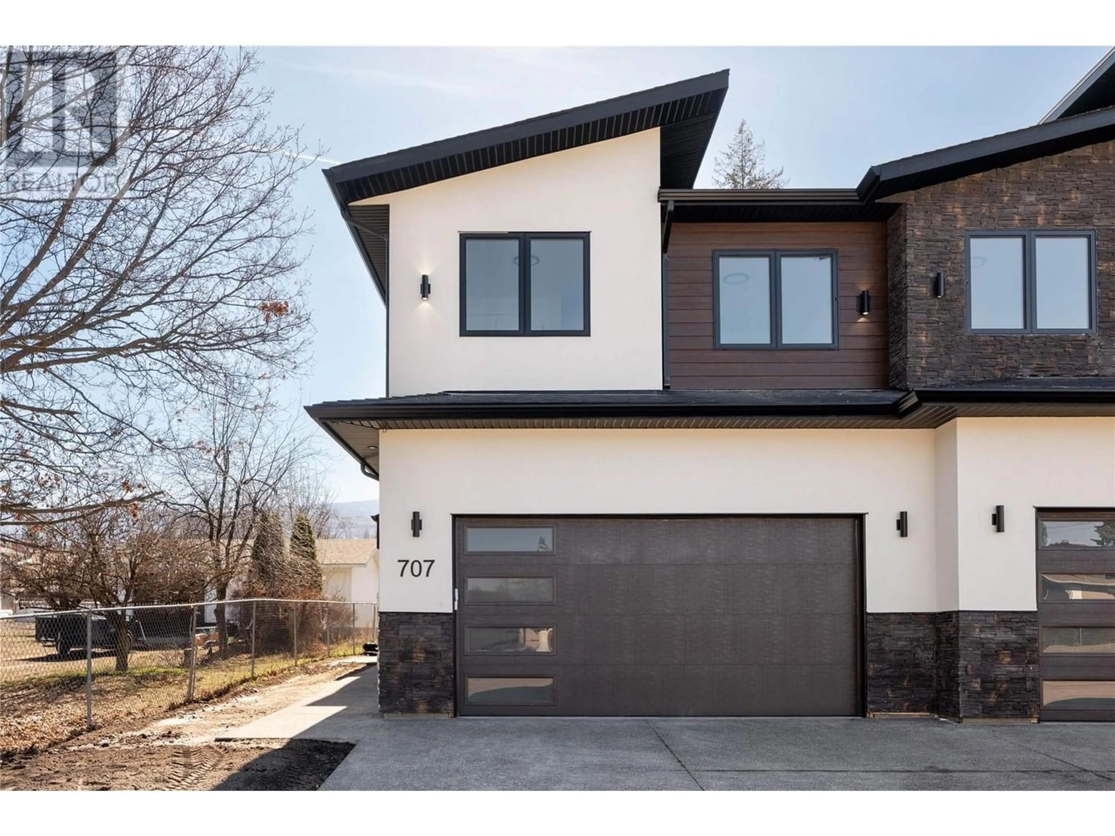 Frontside or backside of a home for 707 Raymer Road, Kelowna British Columbia V1W1T3