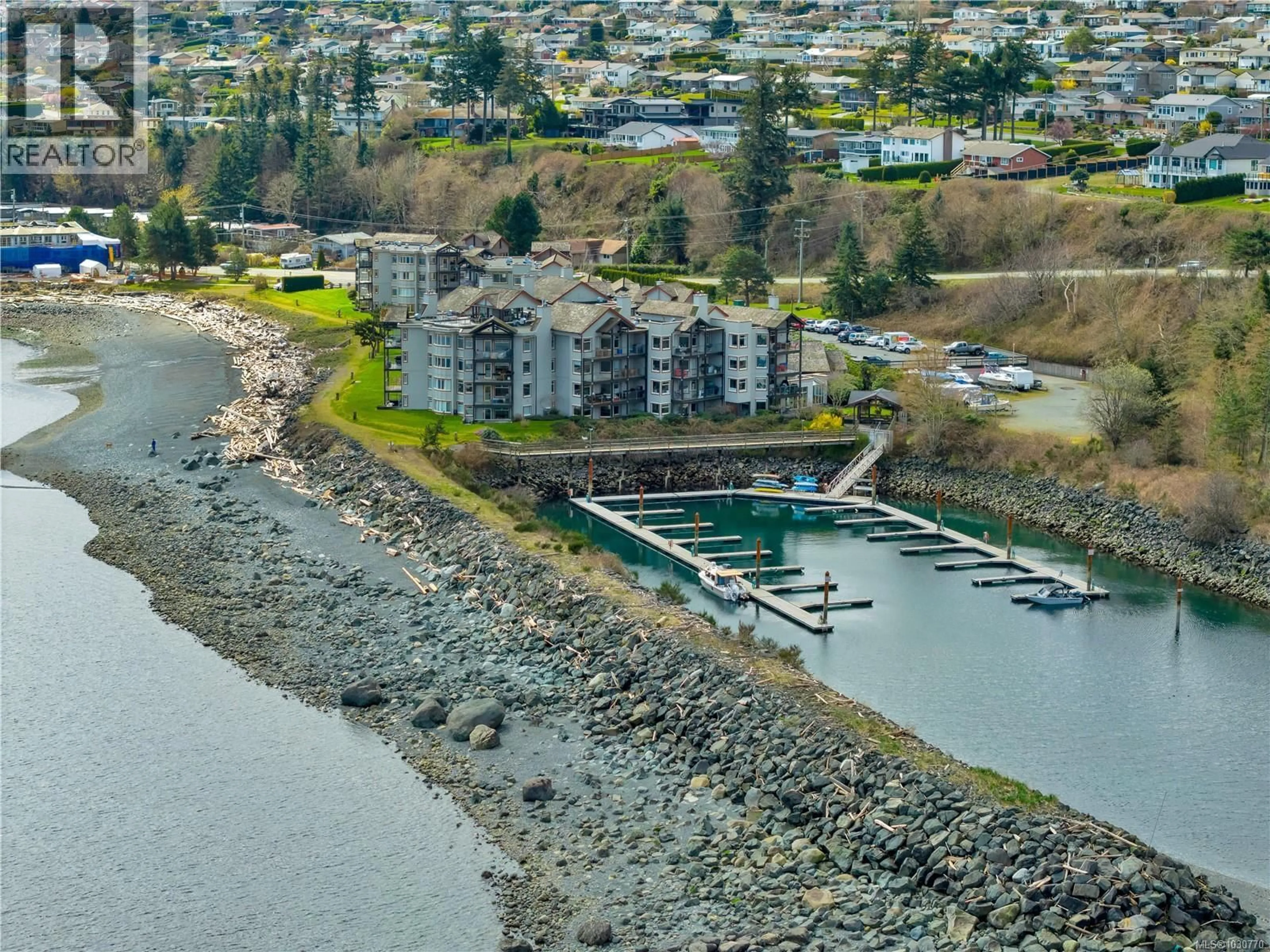 A pic from outside/outdoor area/front of a property/back of a property/a pic from drone, water/lake/river/ocean view for 1401 - 27 ISLAND HIGHWAY SOUTH, Campbell River British Columbia V9P1A2