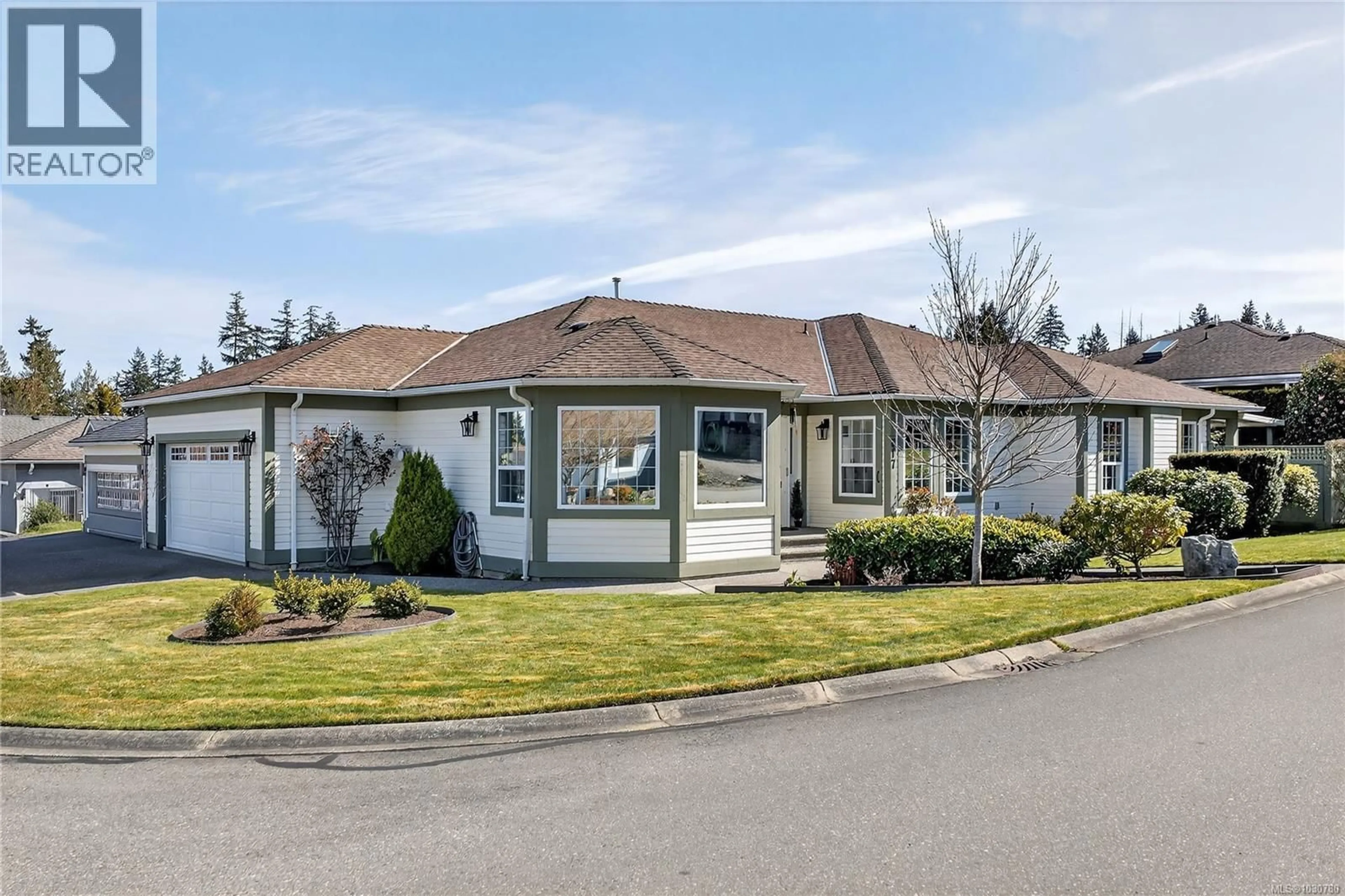 Home with vinyl exterior material, street for 617 WINDWARD WAY, Qualicum Beach British Columbia V9K2K4