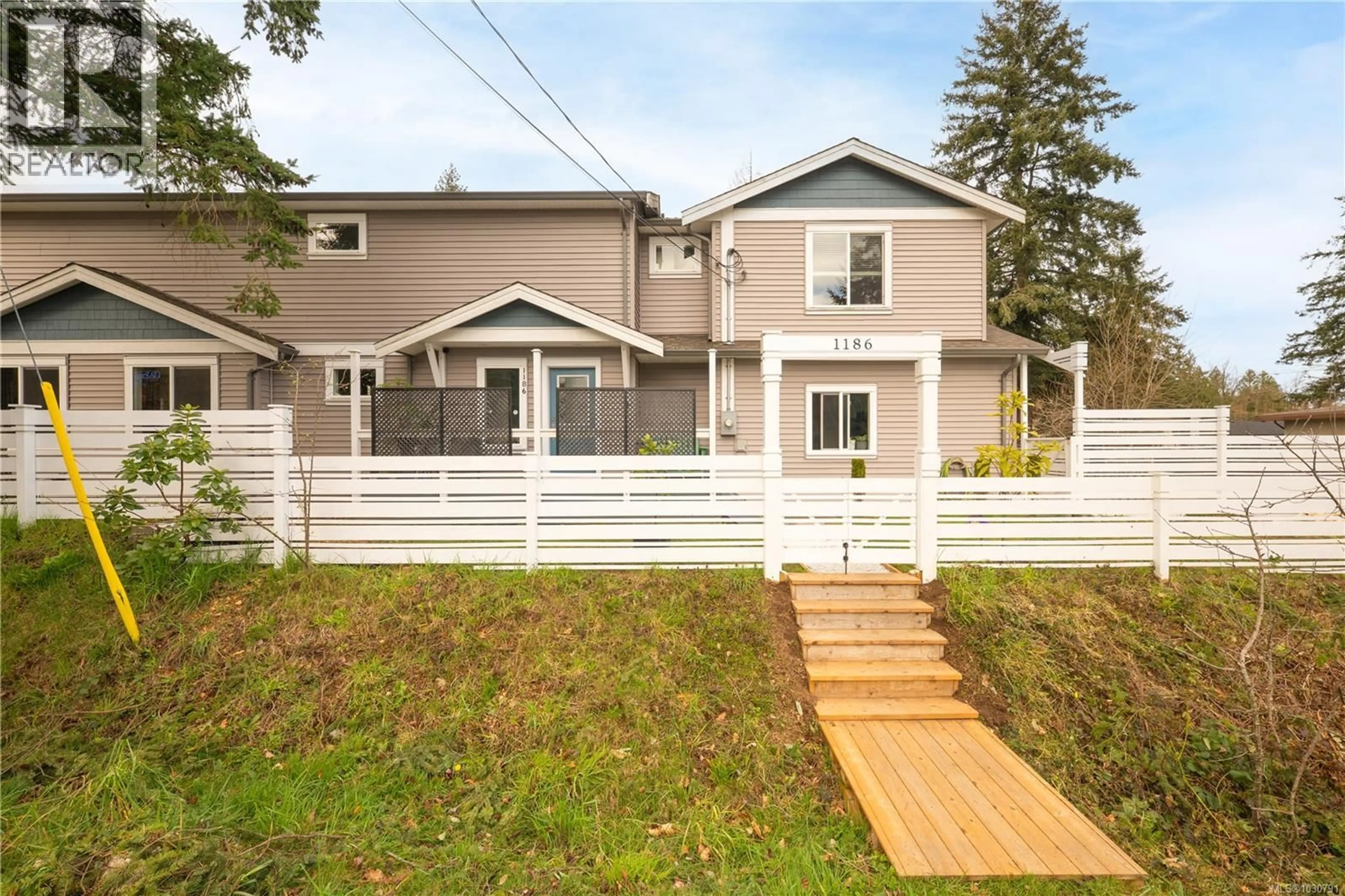 Home with vinyl exterior material, street for 1186 ST. PATRICK CRESCENT, Nanaimo British Columbia V9S2C3