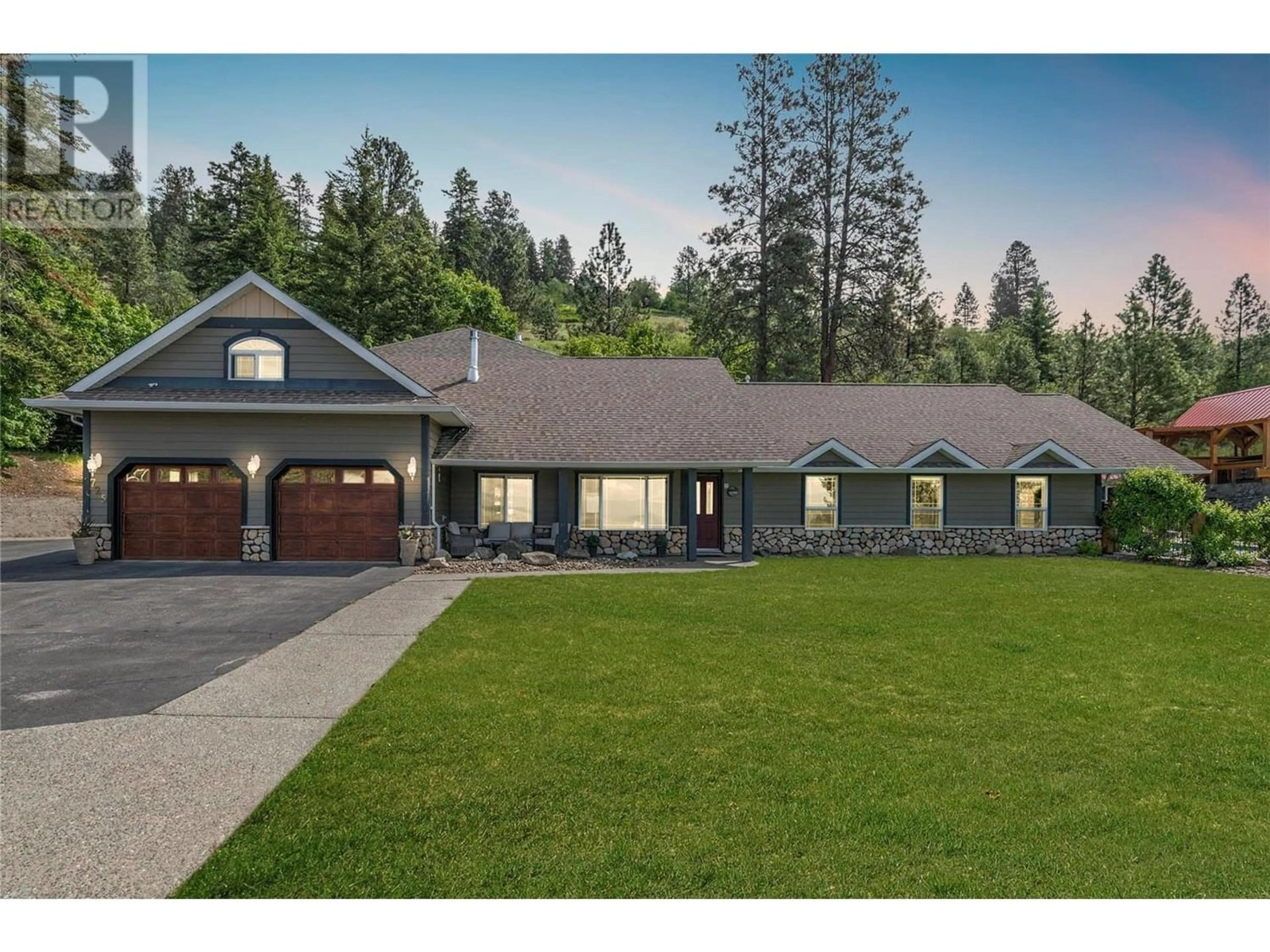 Frontside or backside of a home for 725 Cypress Drive, Coldstream British Columbia V1B2X9