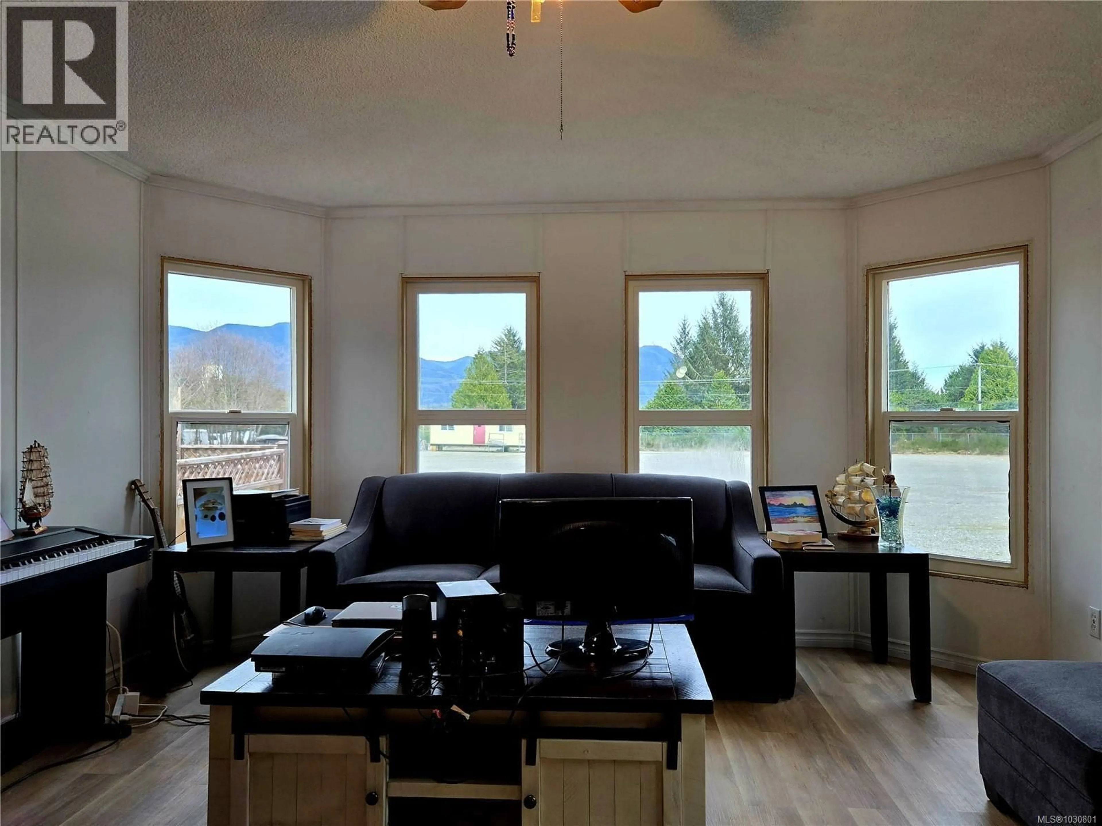 Living room with furniture, wood/laminate floor for 2 - 2390 PACIFIC RIM HIGHWAY, Ucluelet British Columbia V0R3A0