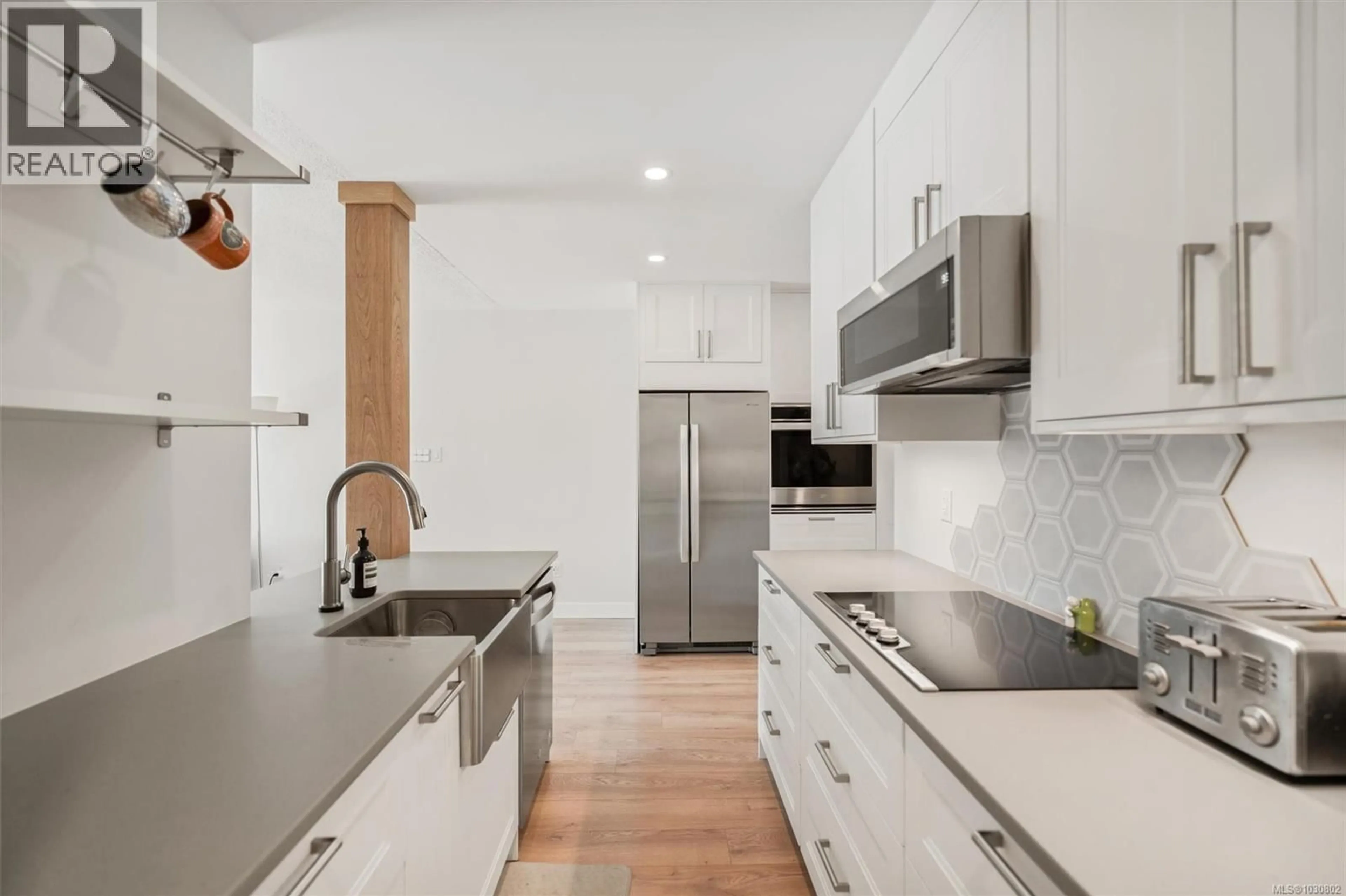 Contemporary kitchen, ceramic/tile floor for 301 - 1680 POPLAR AVENUE, Saanich British Columbia V8P4K7