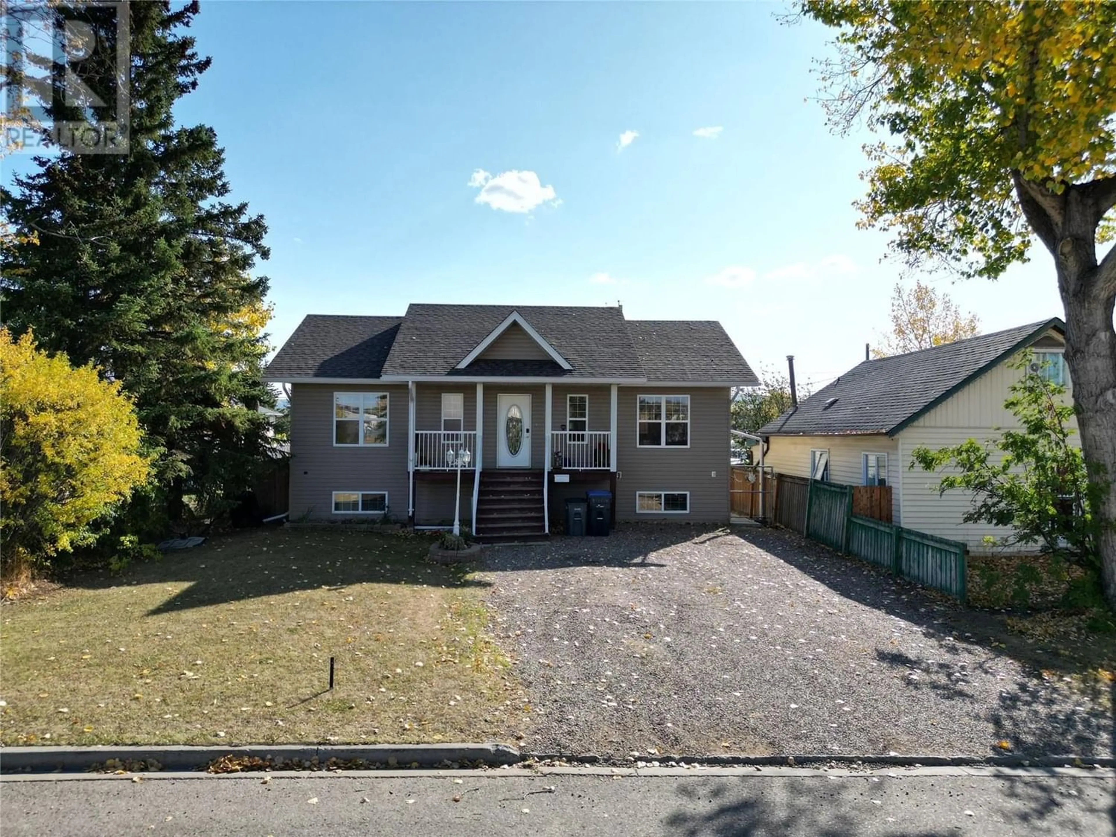 Frontside or backside of a home for 1437 104 Avenue, Dawson Creek British Columbia V1G2J9