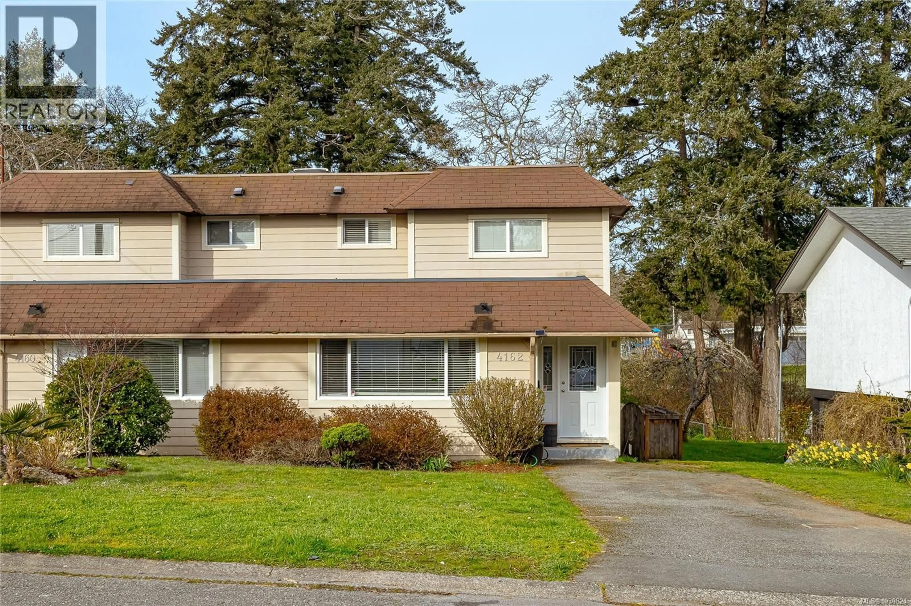 Home with vinyl exterior material, street for 4162 BORDEN STREET, Saanich British Columbia V8X2G5