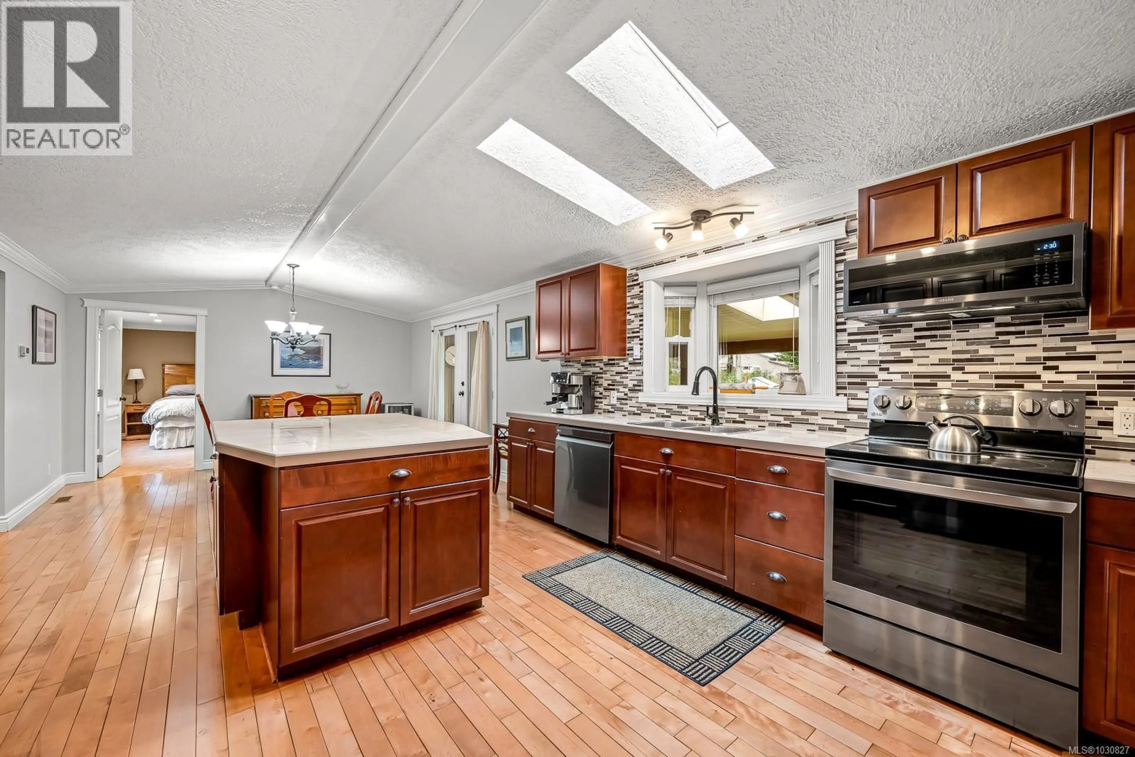 Open concept kitchen, ceramic/tile floor for 1941 BURDYNY ROAD, Comox British Columbia V9M3Z9