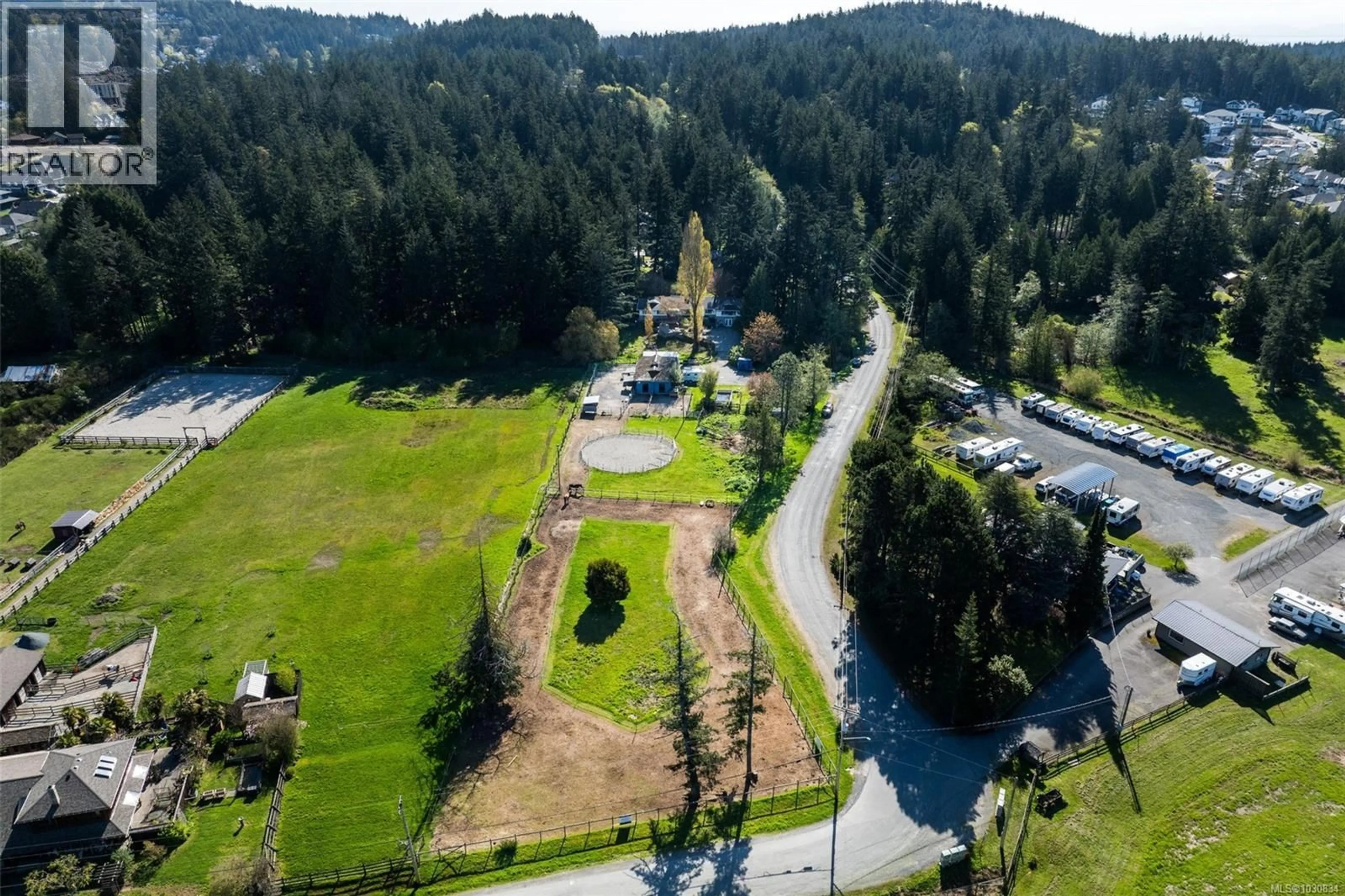 A pic from outside/outdoor area/front of a property/back of a property/a pic from drone, mountain view for 946 KLAHANIE DRIVE, Langford British Columbia V9C3X2