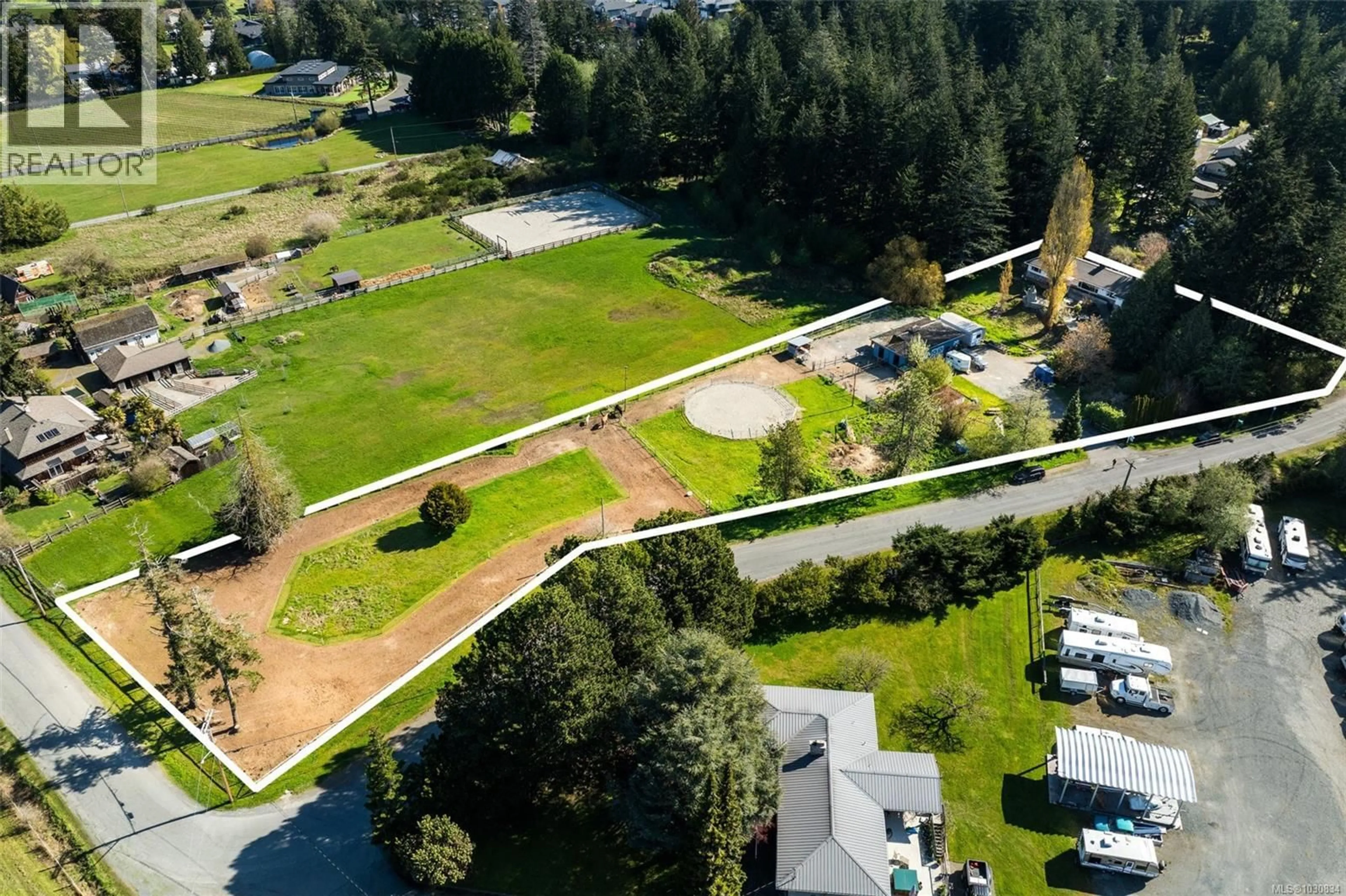 A pic from outside/outdoor area/front of a property/back of a property/a pic from drone, street for 946 KLAHANIE DRIVE, Langford British Columbia V9C3X2
