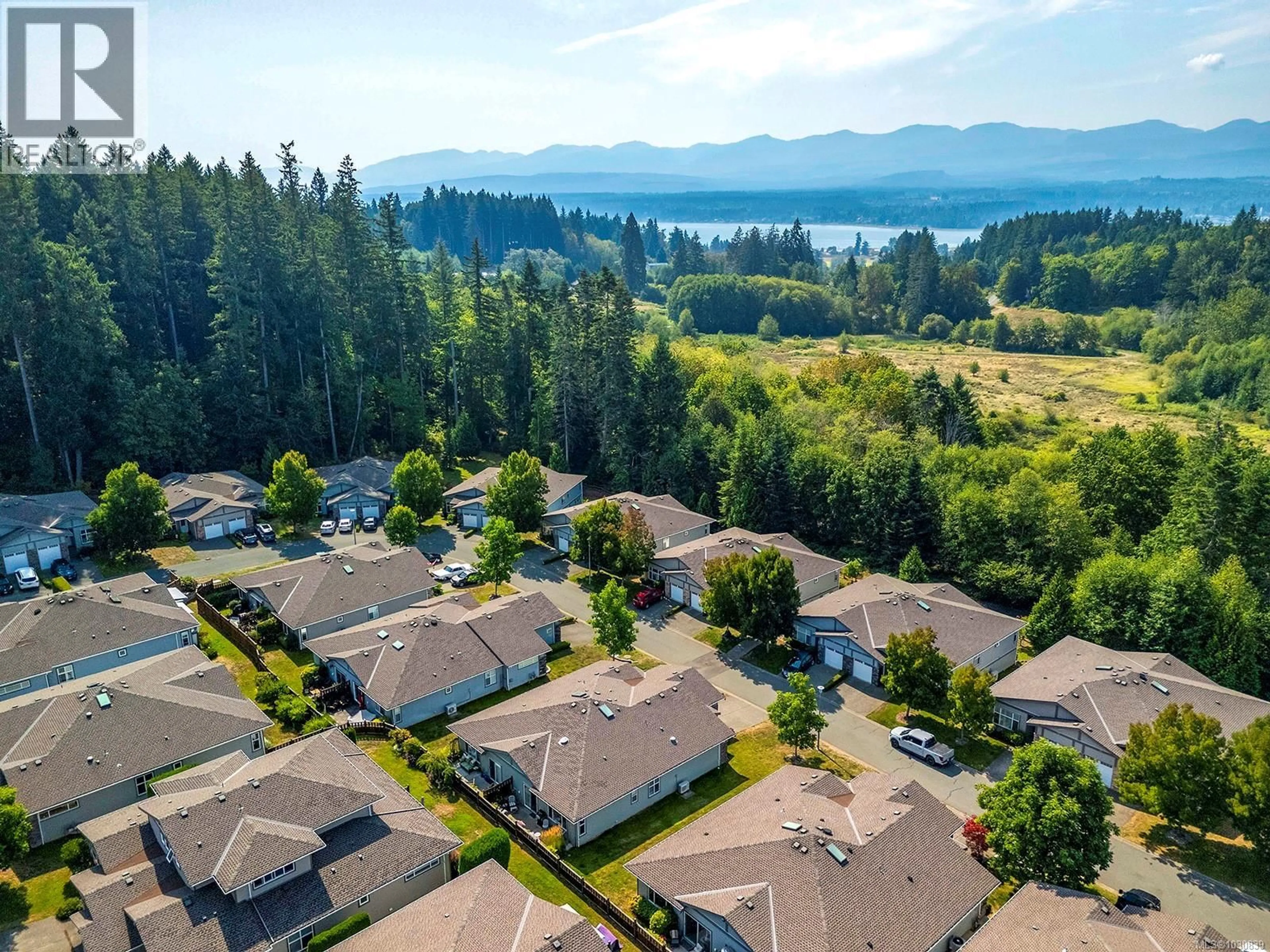 A pic from outside/outdoor area/front of a property/back of a property/a pic from drone, unknown for 50 - 2001 BLUE JAY PLACE, Courtenay British Columbia V9N4A8