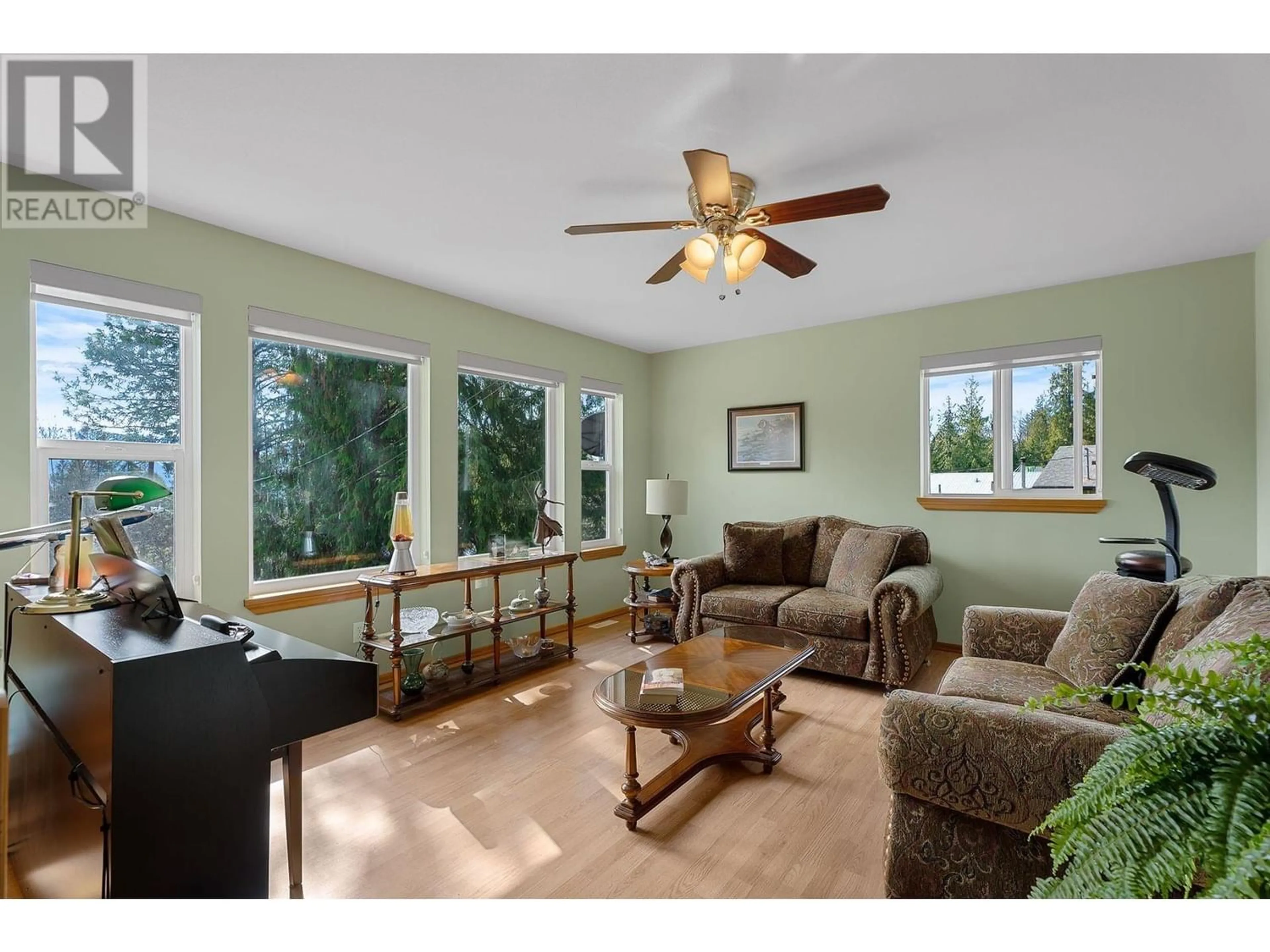 Living room, wood floors for 7451 Estate Drive, Anglemont British Columbia V0E1M8