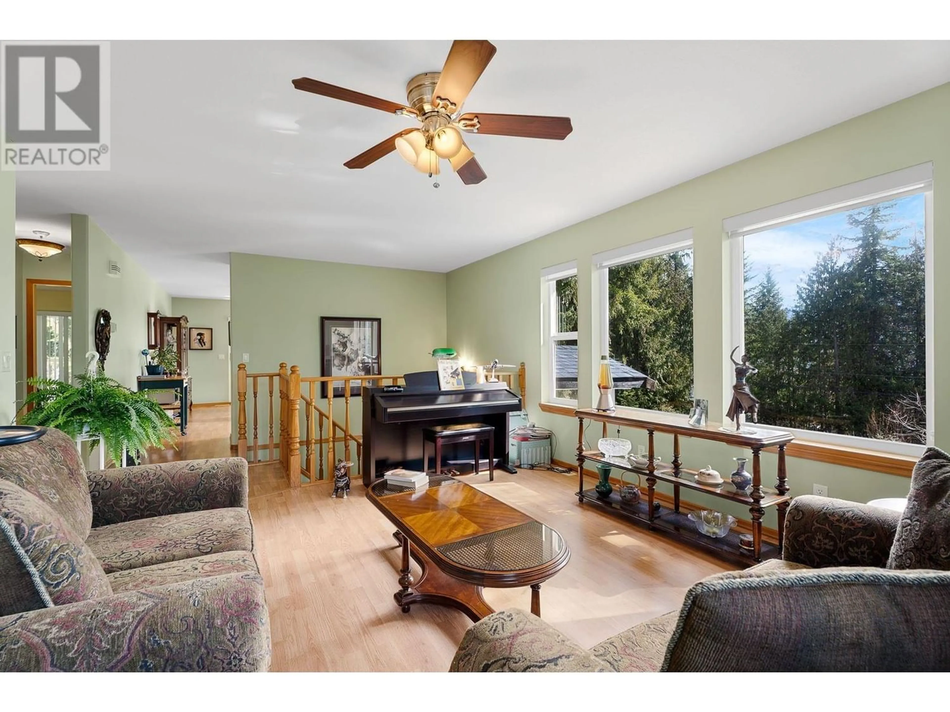 Living room, wood floors for 7451 Estate Drive, Anglemont British Columbia V0E1M8